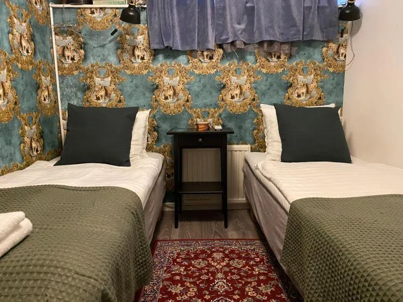 Bed in Hotel Tre Små Rum