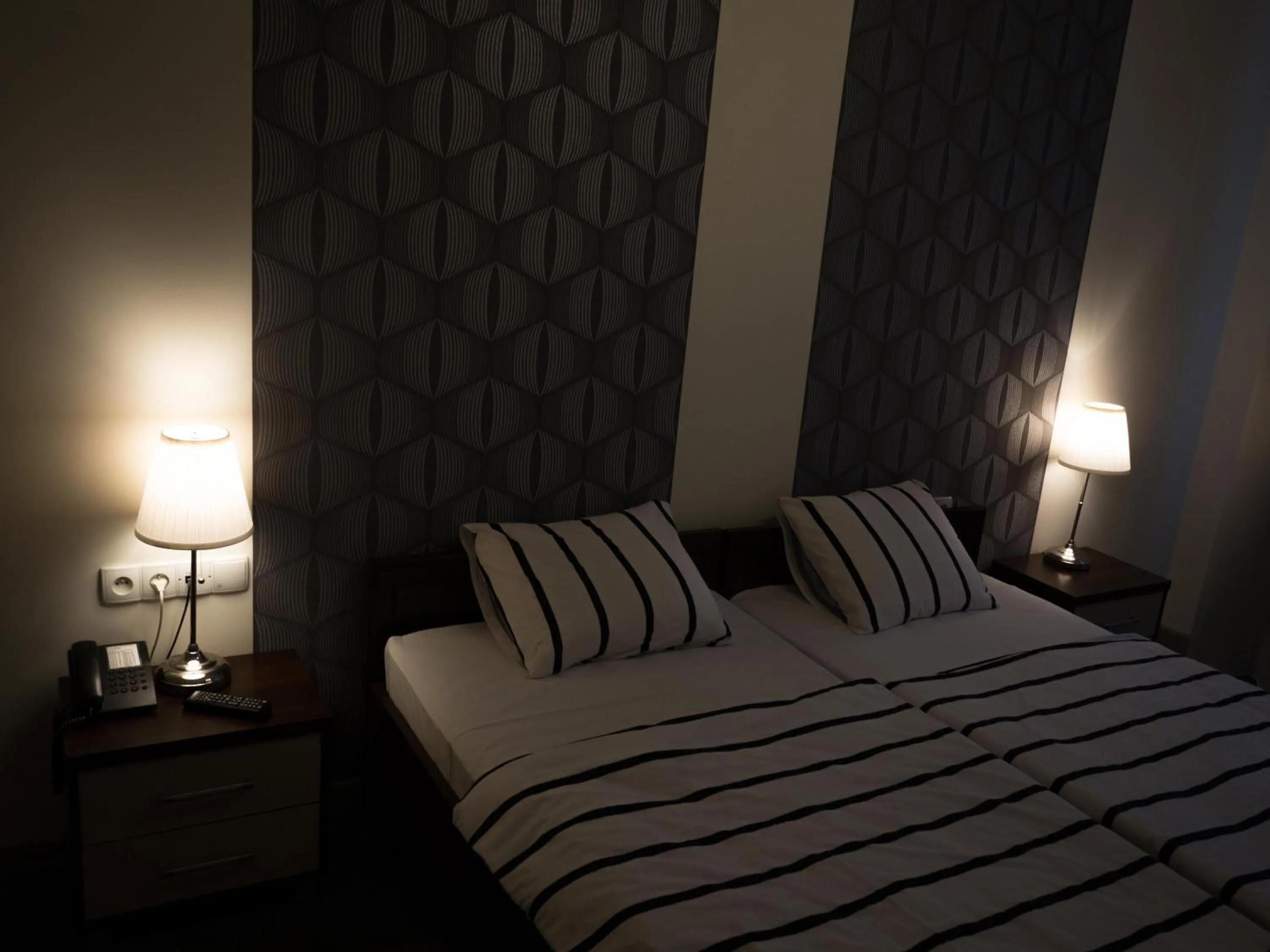 Bed in Brama Old City Rooms