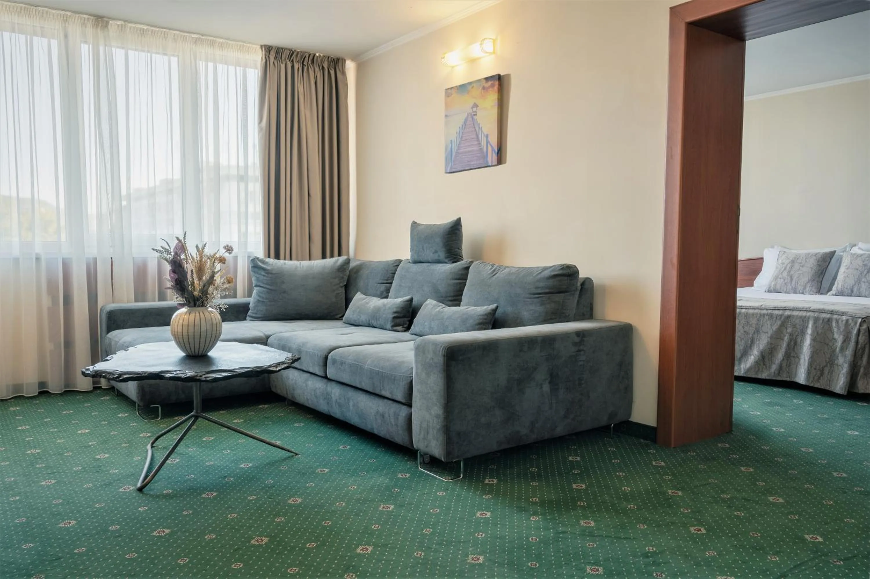 Communal lounge/ TV room, Bed in Hotel Orbita