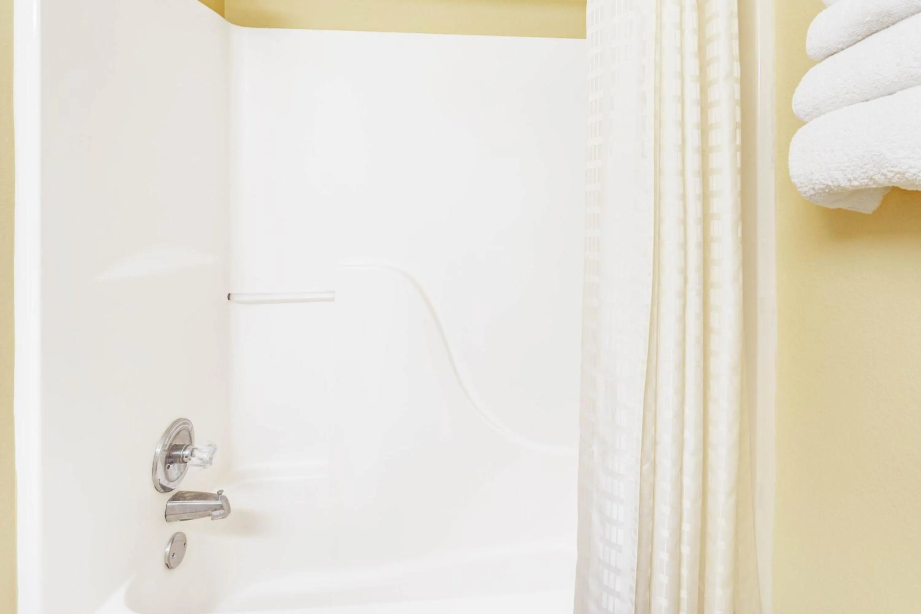 Shower in Super 8 by Wyndham McKinney/Plano Area