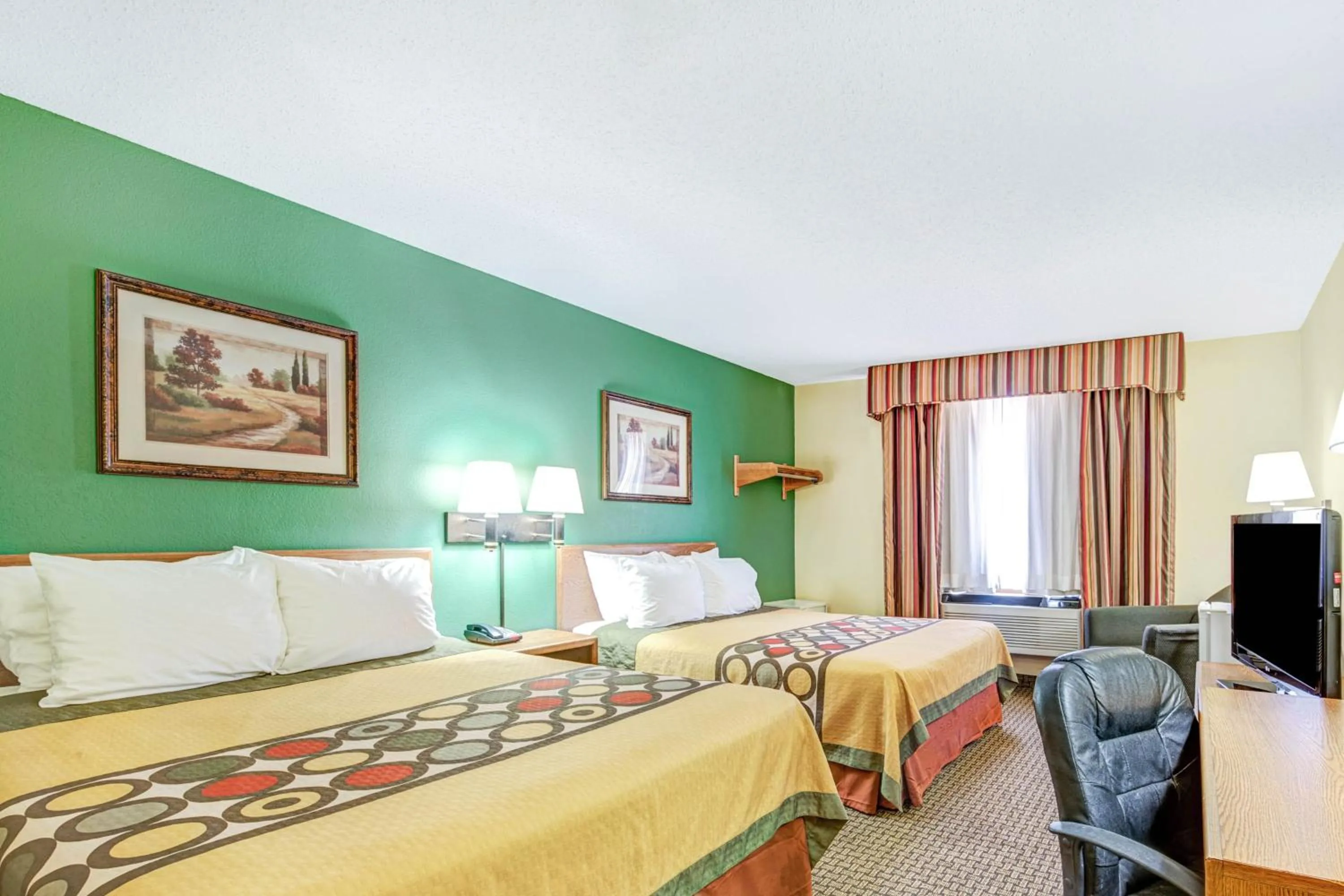 Bed in Super 8 by Wyndham McKinney/Plano Area