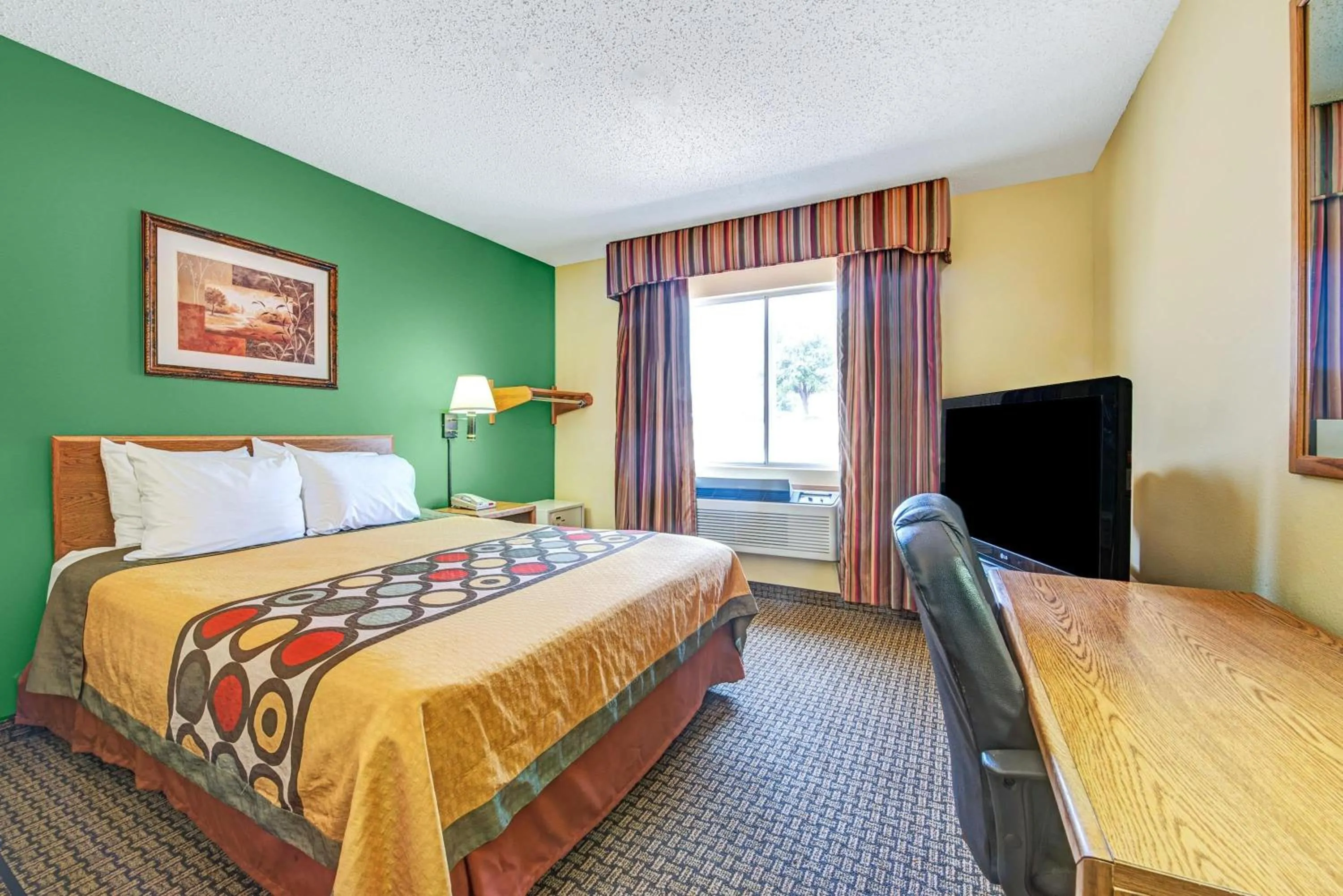 Photo of the whole room, Bed in Super 8 by Wyndham McKinney/Plano Area