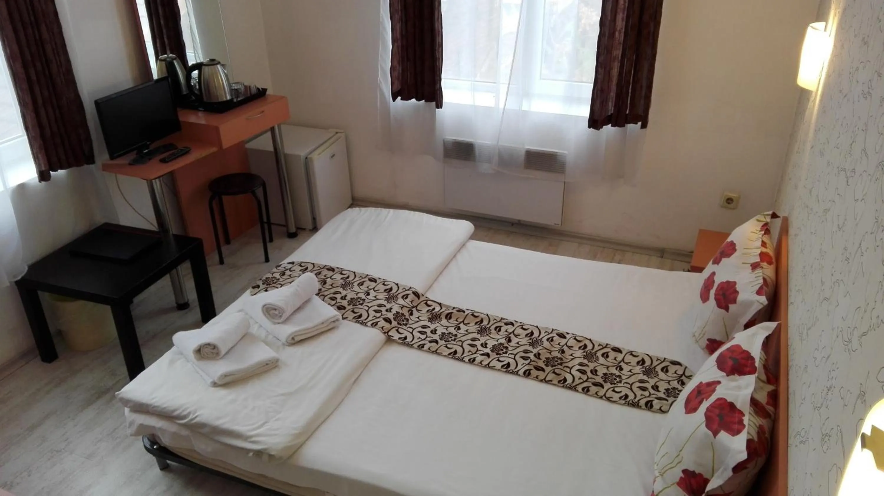 Bed in Scotty's Boutique Hotel