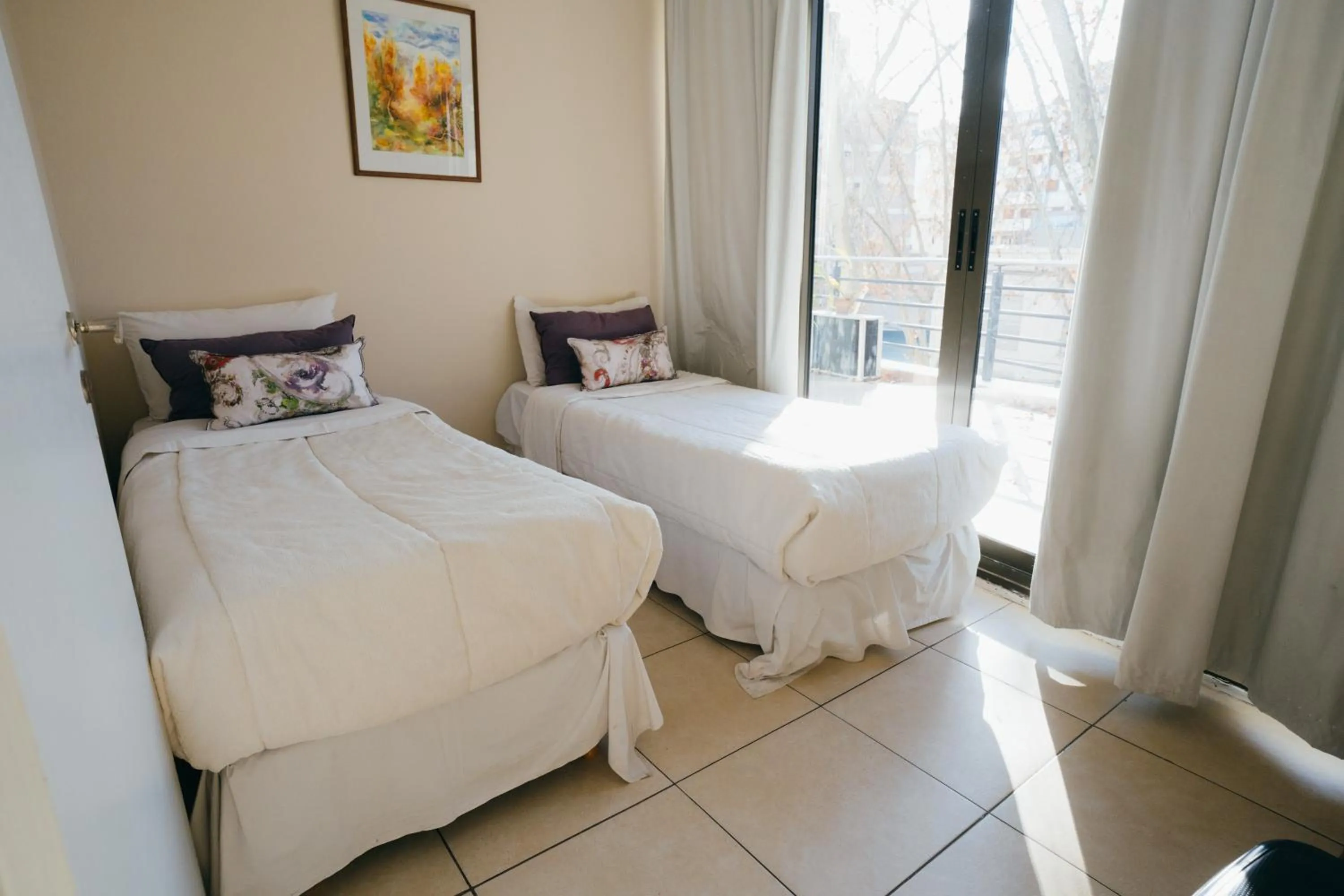 Bed in Uvas Apart Hotel