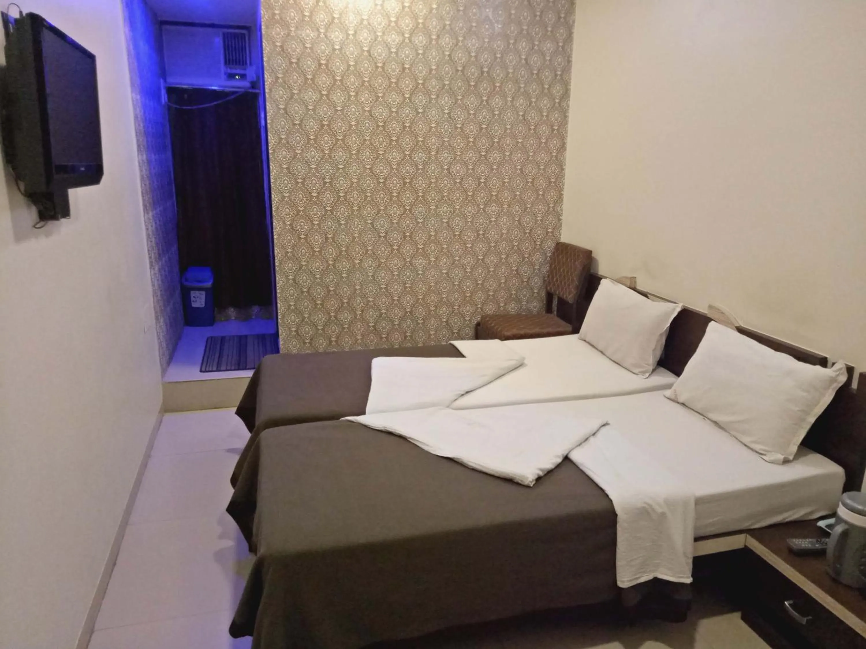 Bed in Hotel Navi Mumbai