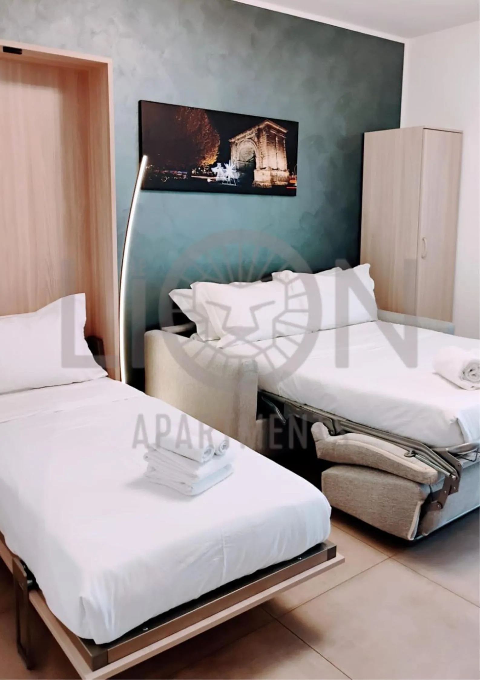 Bed in Le Lion Apartments - Lys Family Apartment