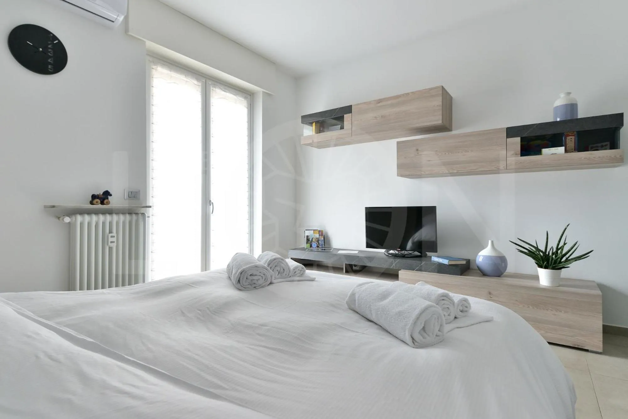 Bed in Le Lion Apartments - Lys Family Apartment