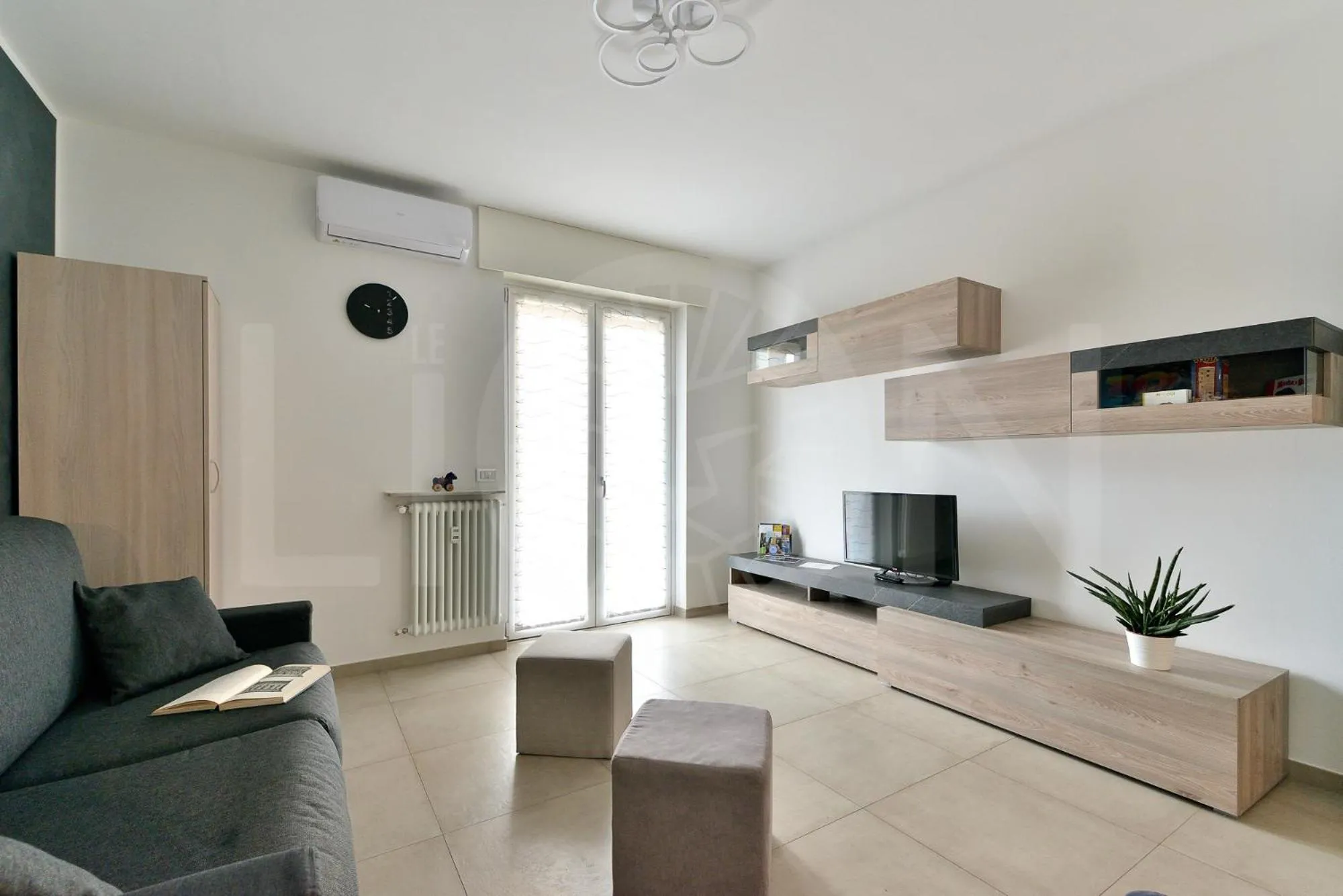 TV and multimedia in Le Lion Apartments - Lys Family Apartment