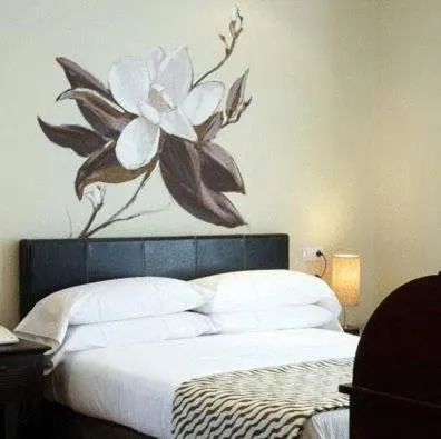 Photo of the whole room, Bed in Hotel el Jardín de Eugenia