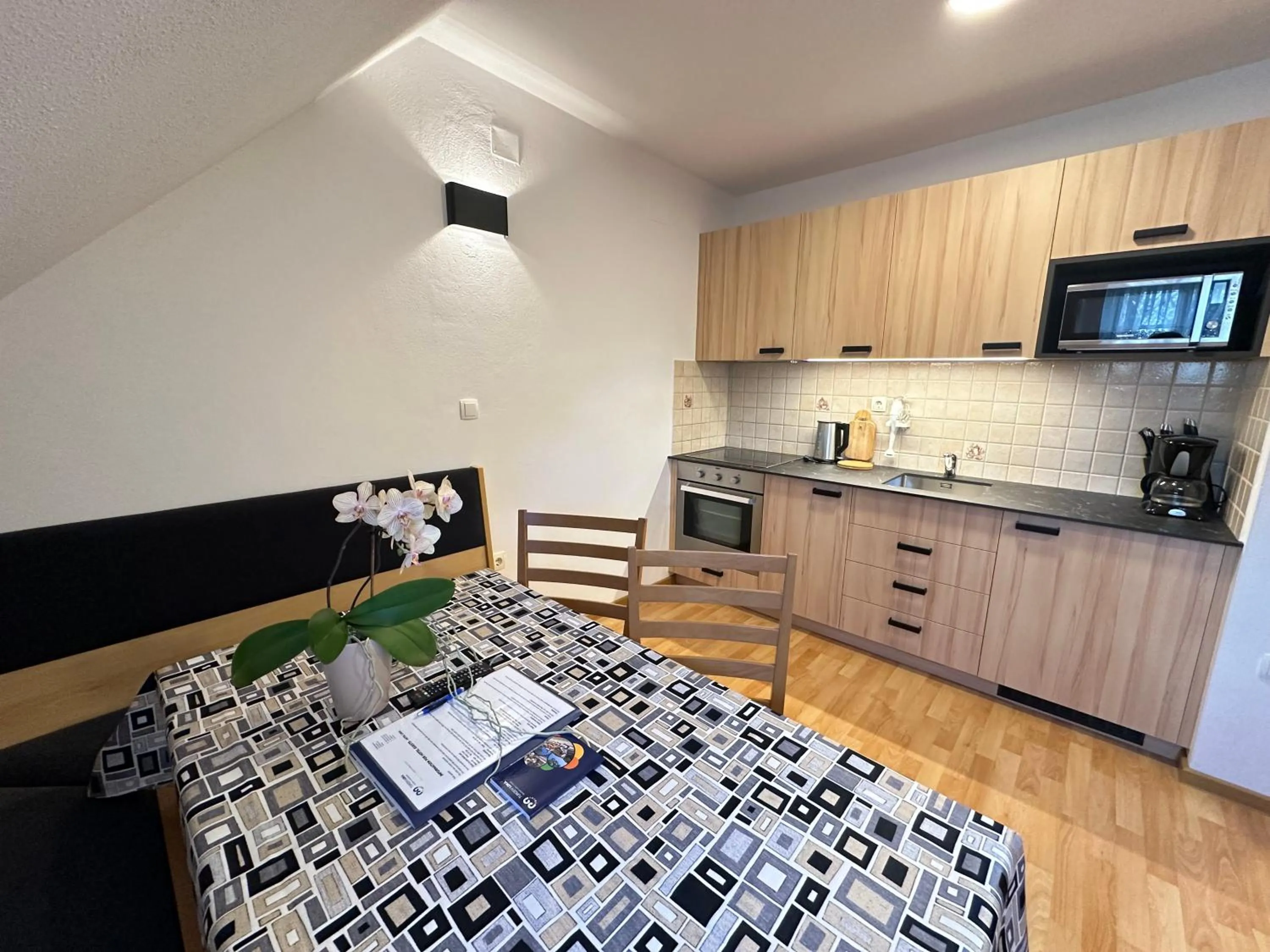 Kitchen or kitchenette, Bed in Boutique Hotel Loka