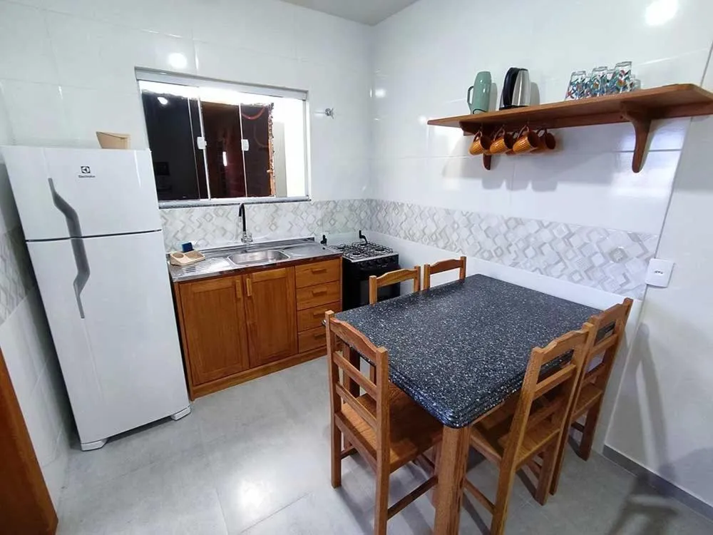 Kitchen or kitchenette in Pousada Pegadas na Areia