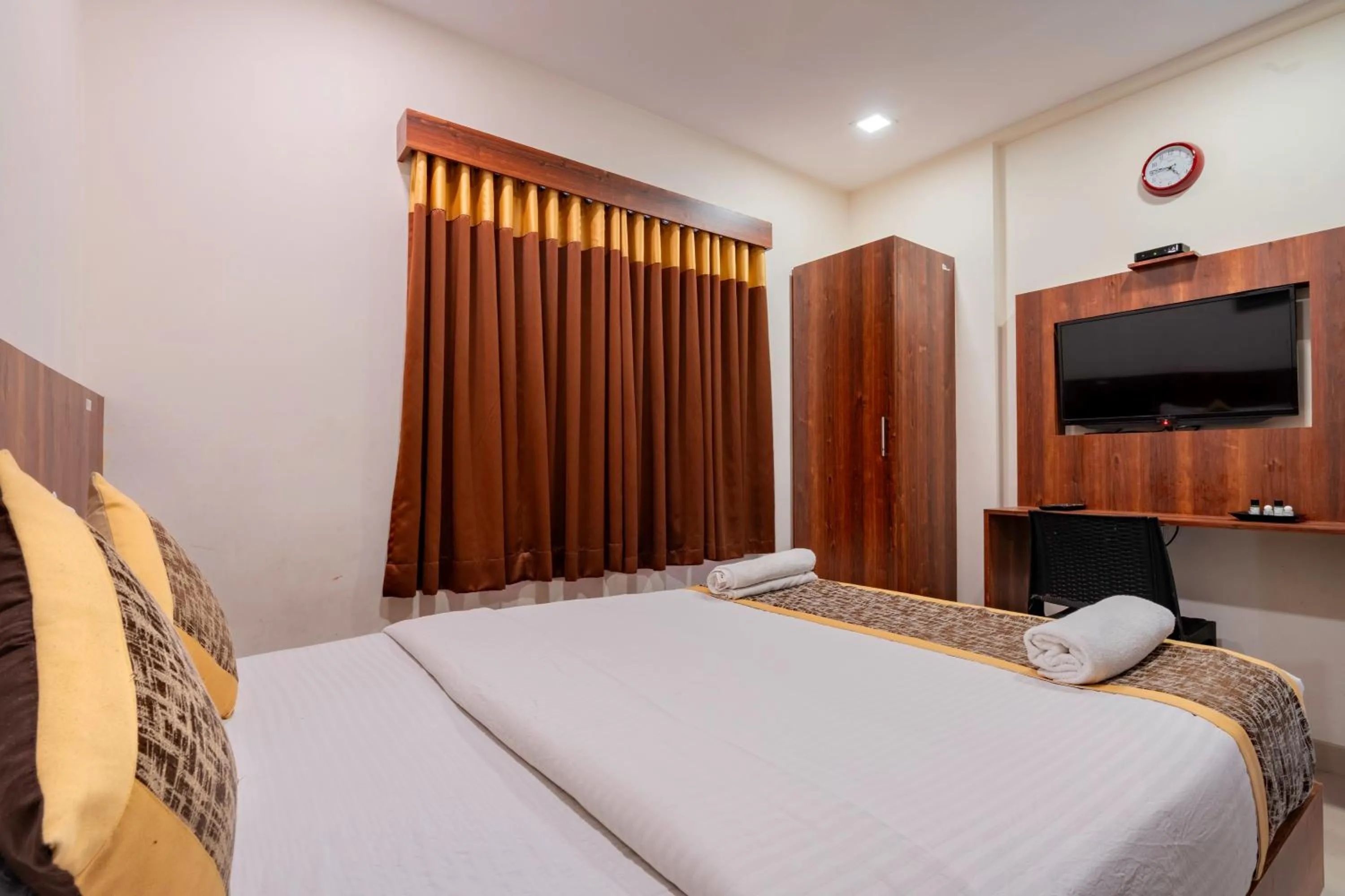 Bed in Prime Palace Hotel - MG Road