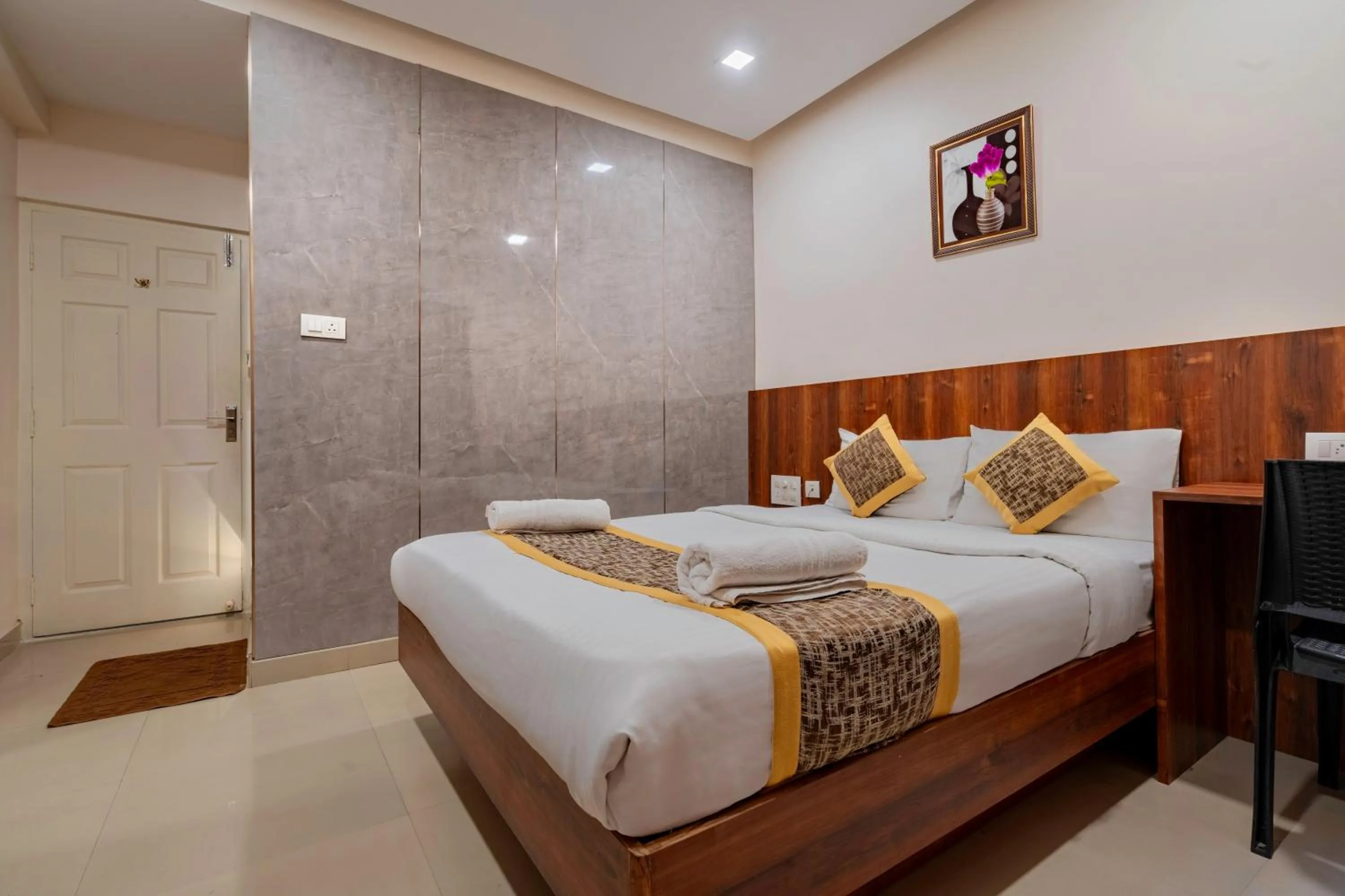 Bed in Prime Palace Hotel - MG Road