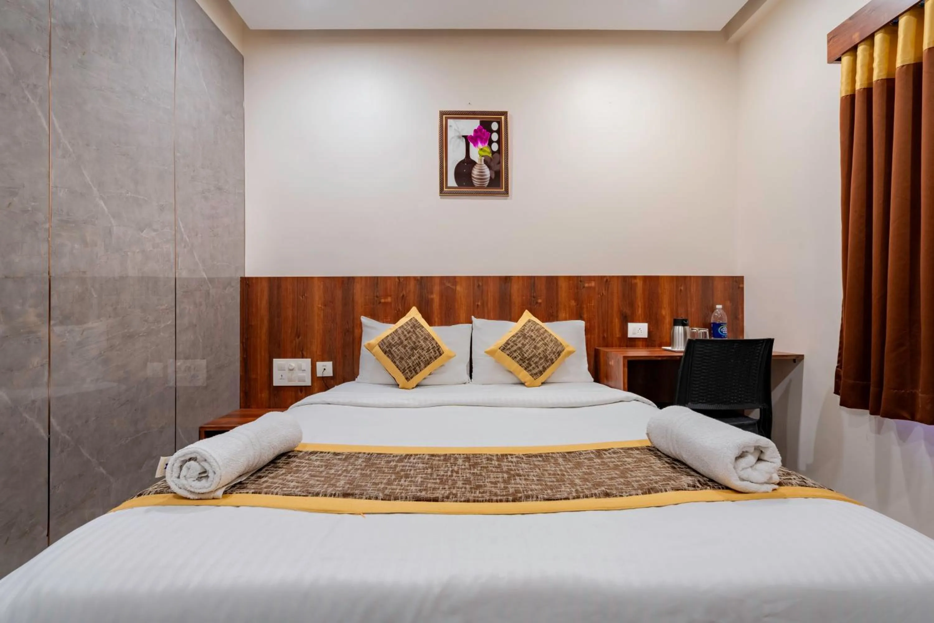 Bed in Prime Palace Hotel - MG Road