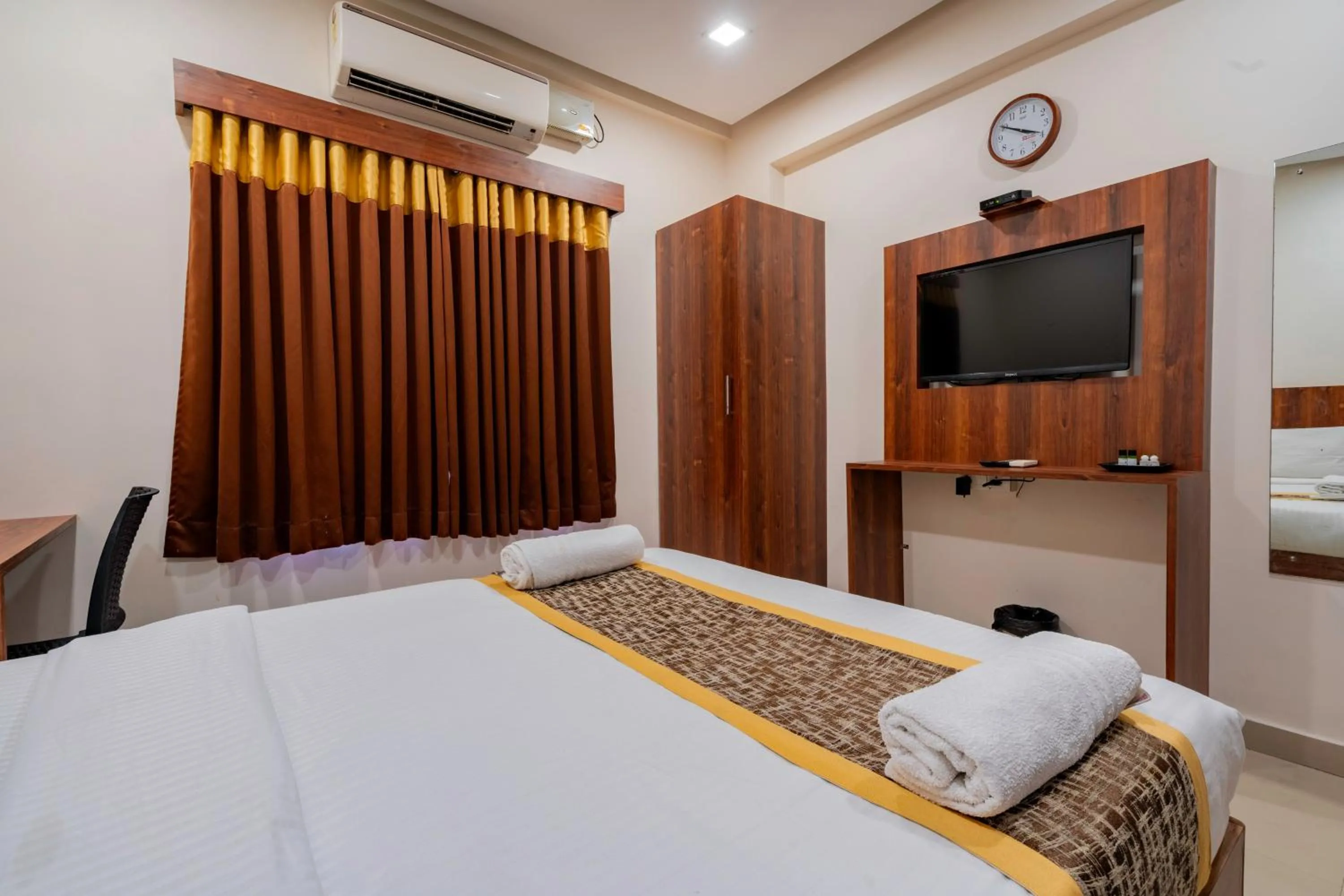 Bed in Prime Palace Hotel - MG Road