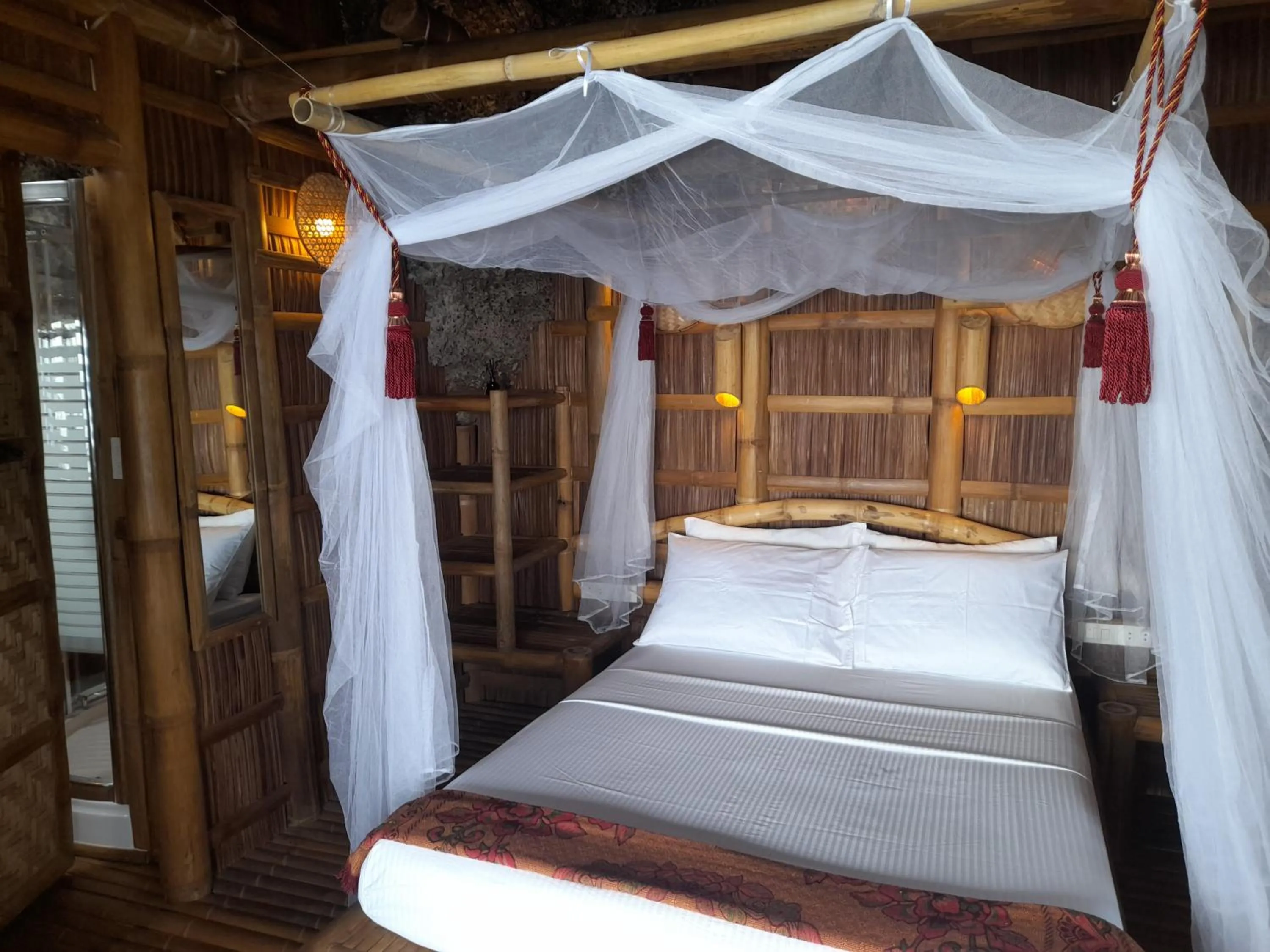 Bed in Kookoo's nest eco-lodge