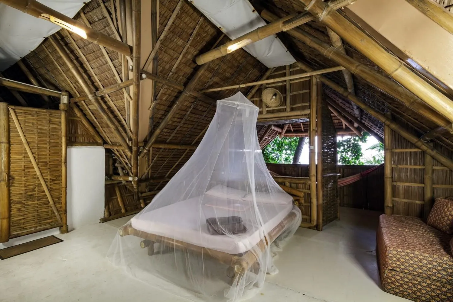 Bed in Kookoo's nest eco-lodge