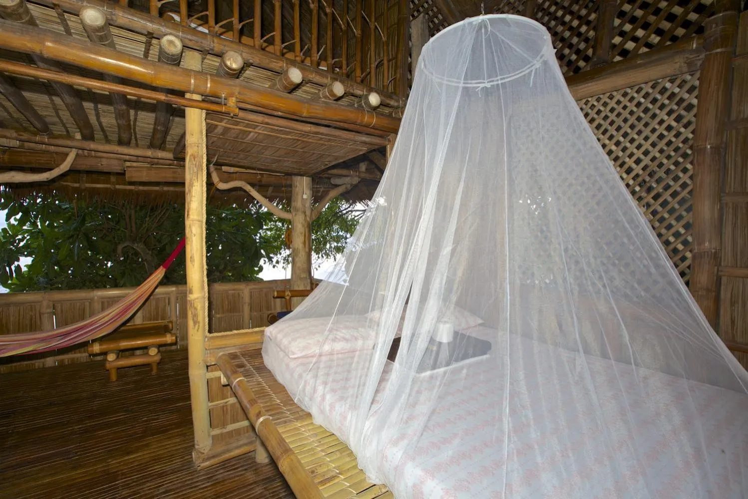 Bed in Kookoo's nest eco-lodge
