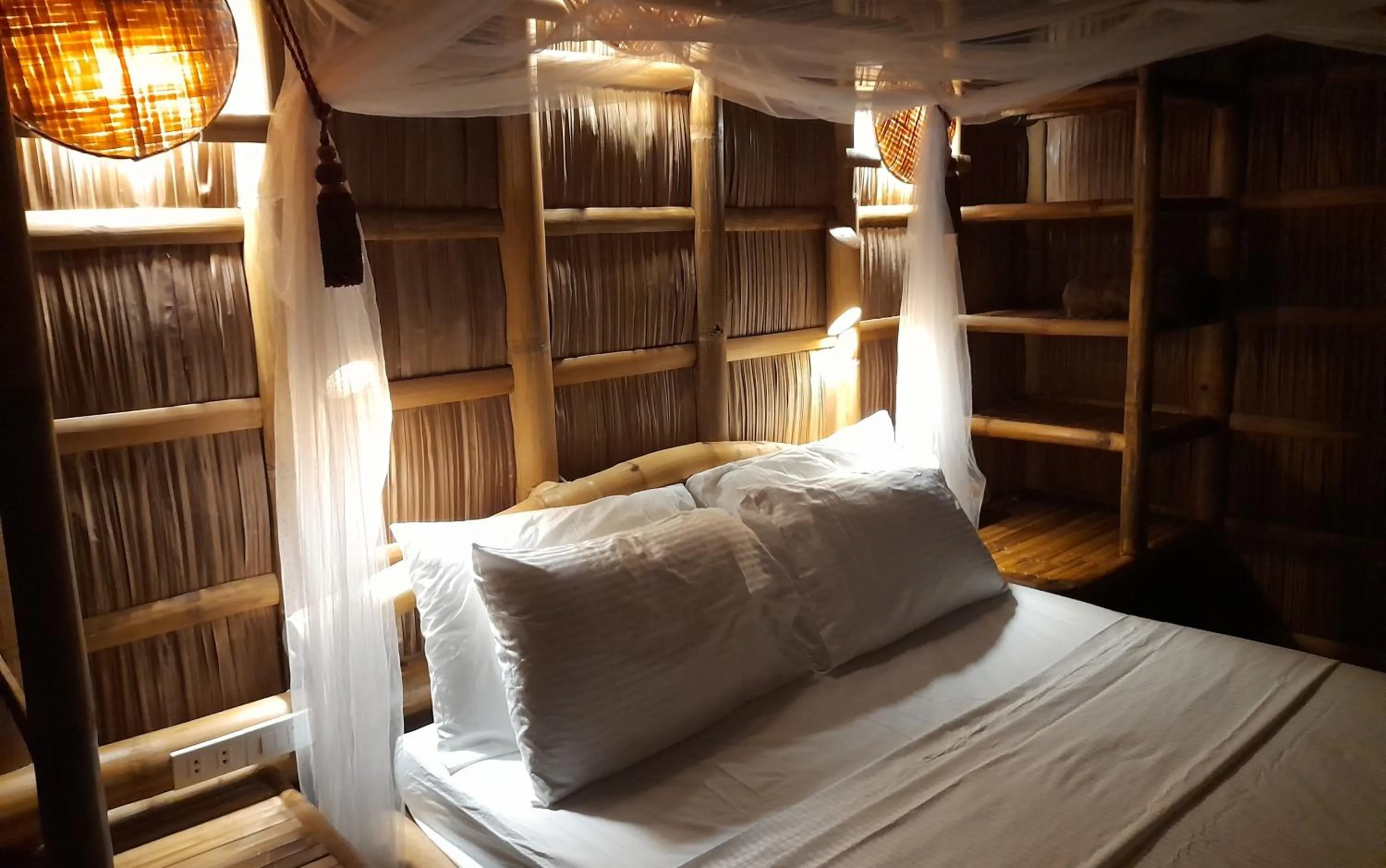 Bed in Kookoo's nest eco-lodge