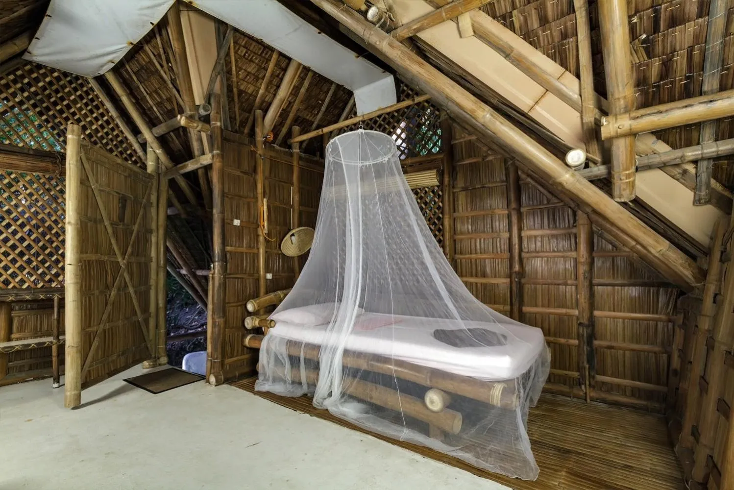 Bed in Kookoo's nest eco-lodge