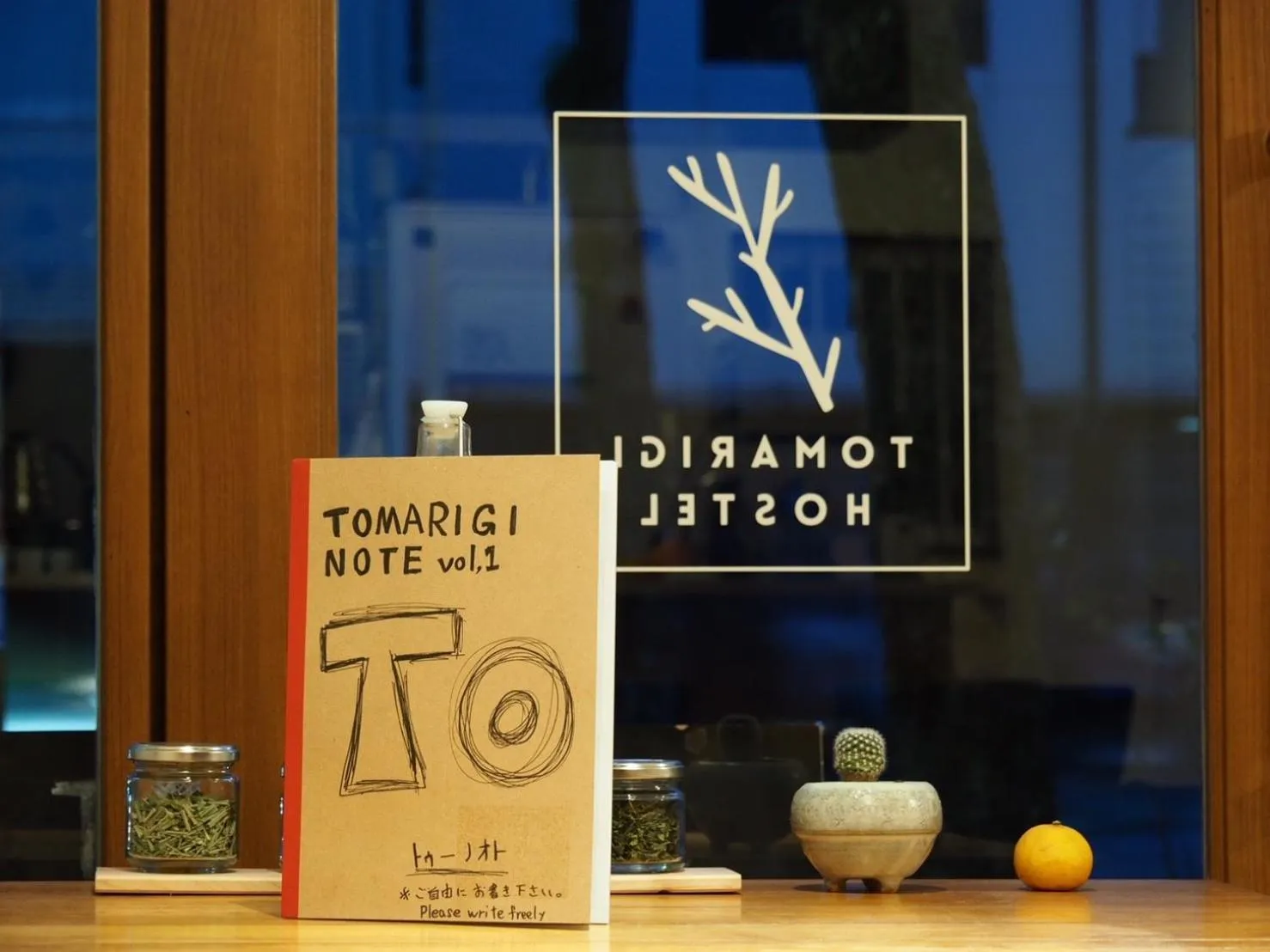 Property logo or sign in Tomarigi Hostel