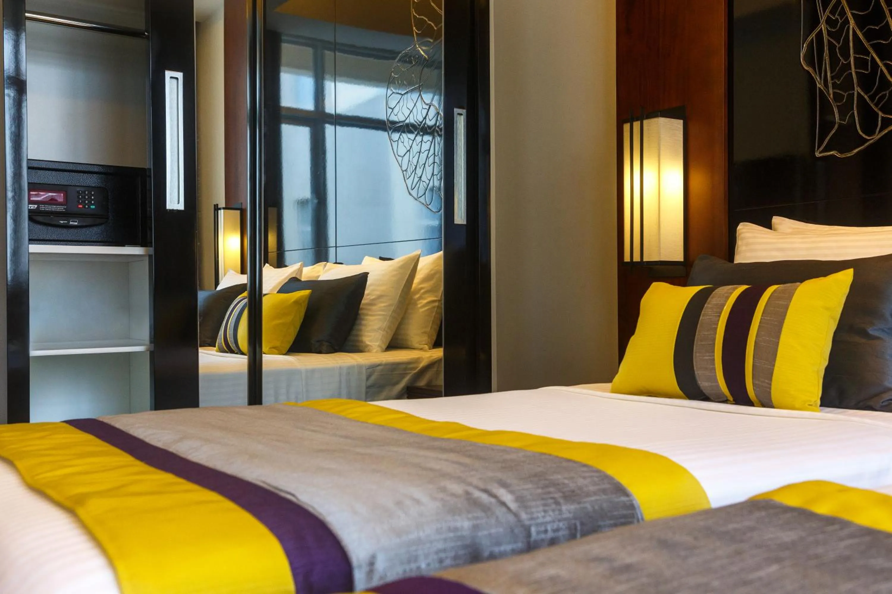 Bed in Renuka City Hotel