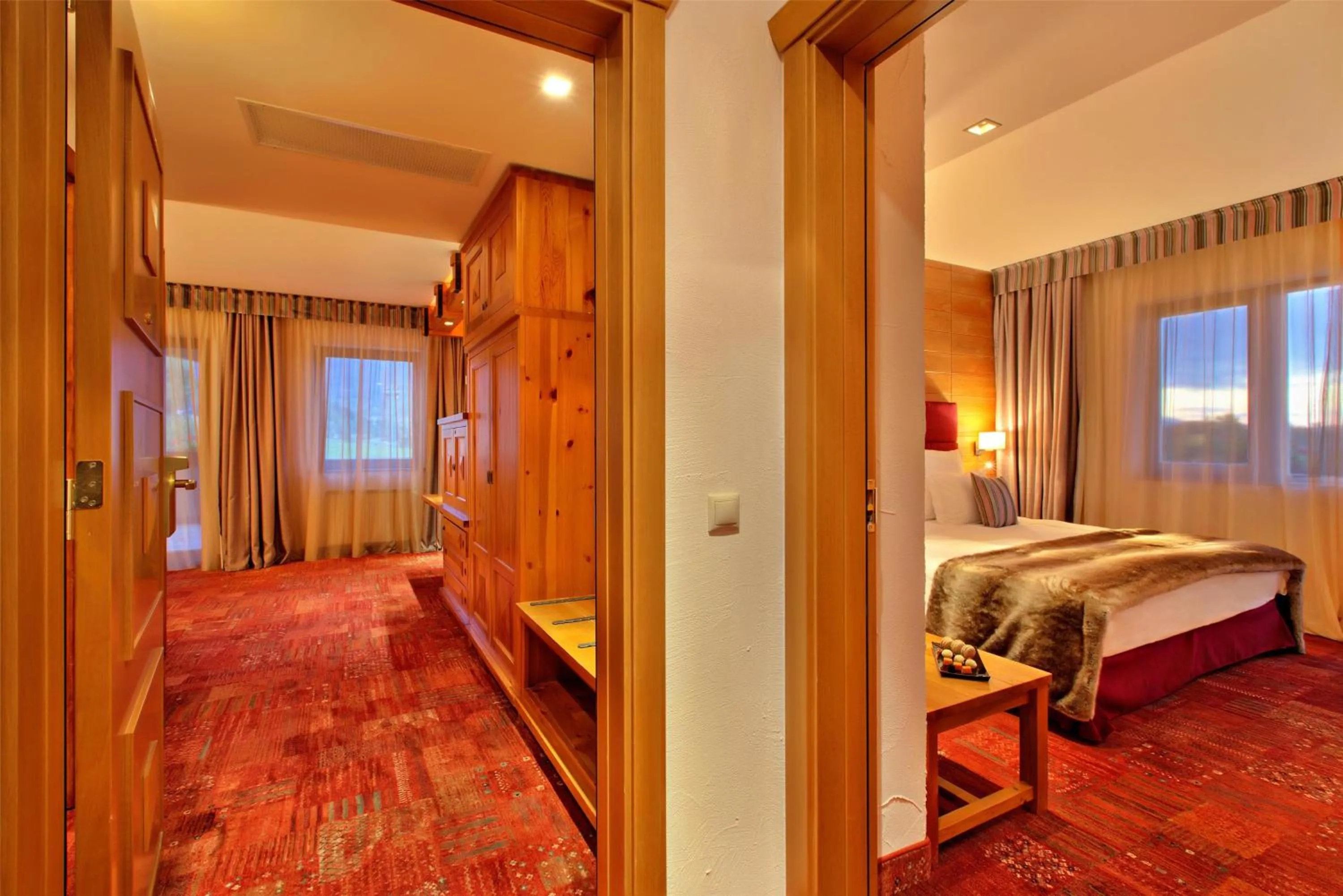 Photo of the whole room, Bed in Kempinski Hotel Grand Arena Bansko