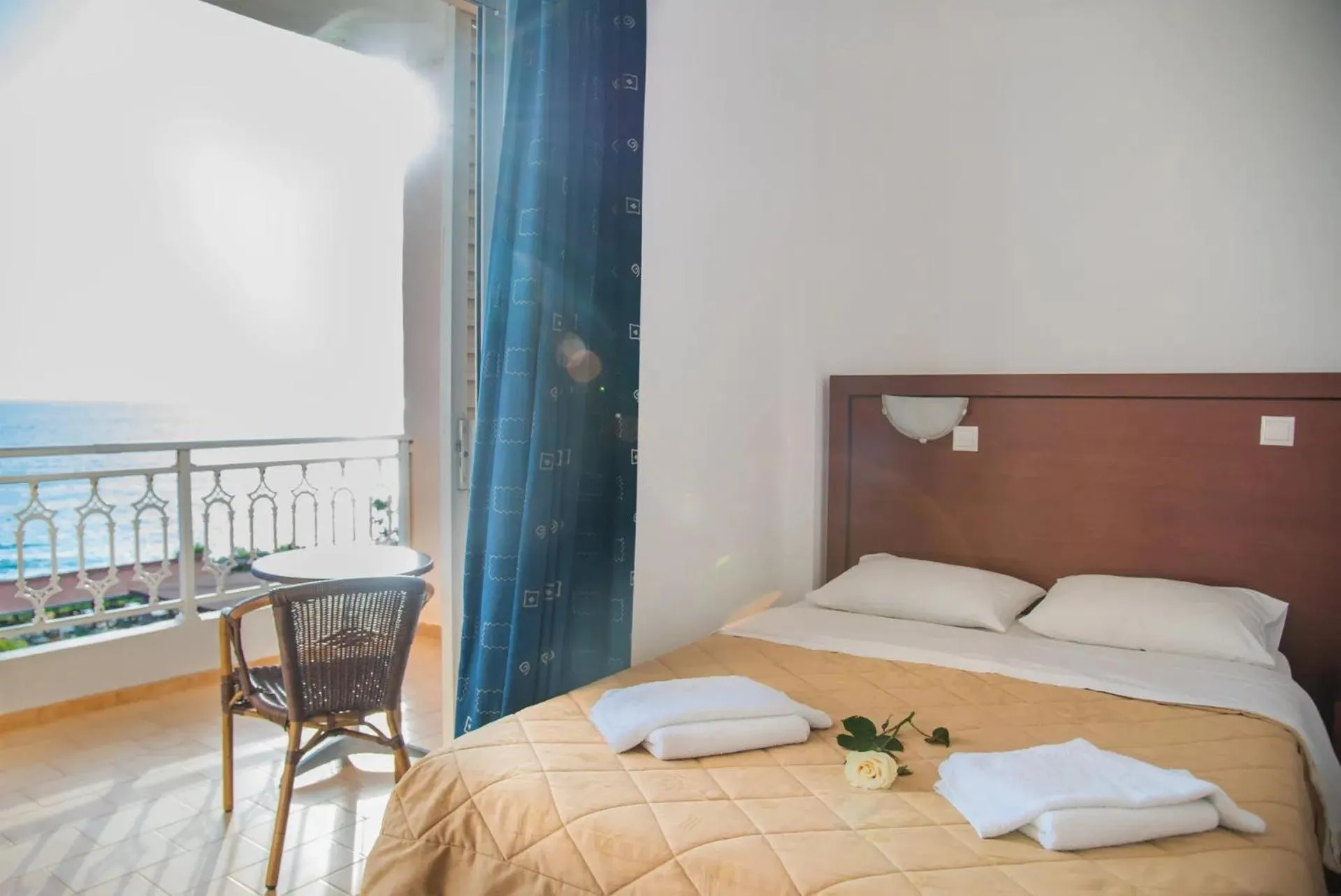 Bed in Poseidon Beach Hotel