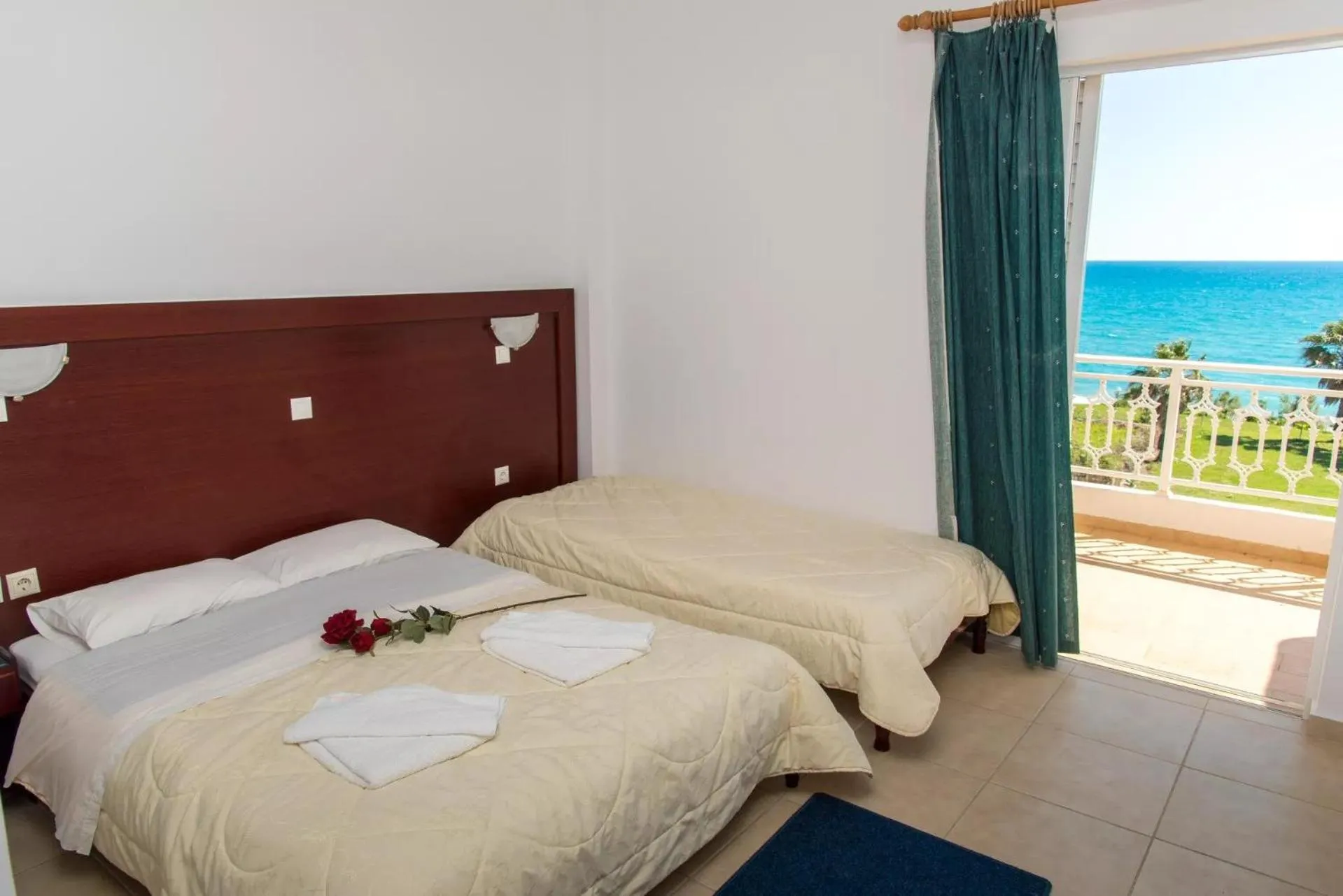 Bed in Poseidon Beach Hotel