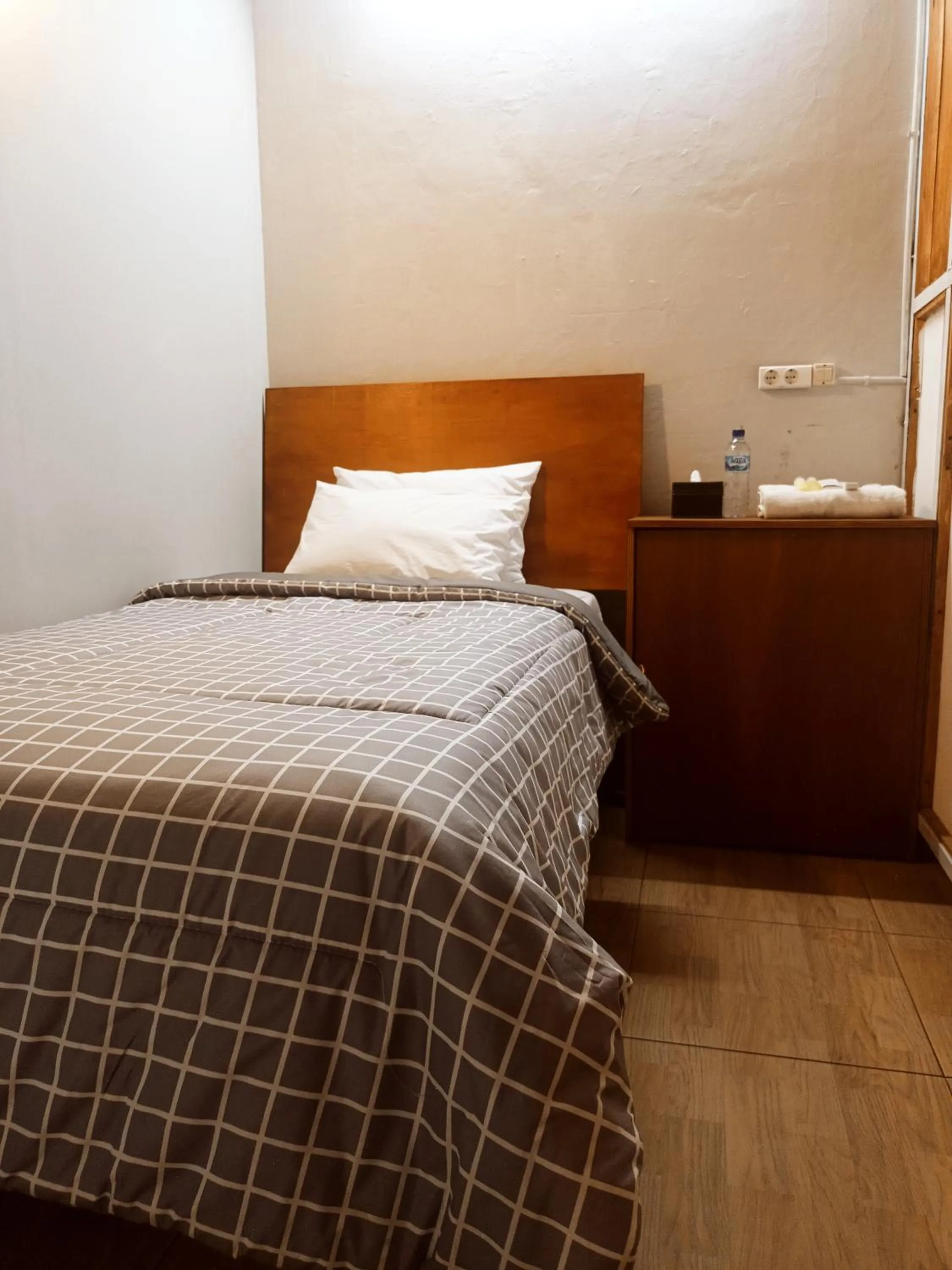 Bed in Watu Agung Guest House