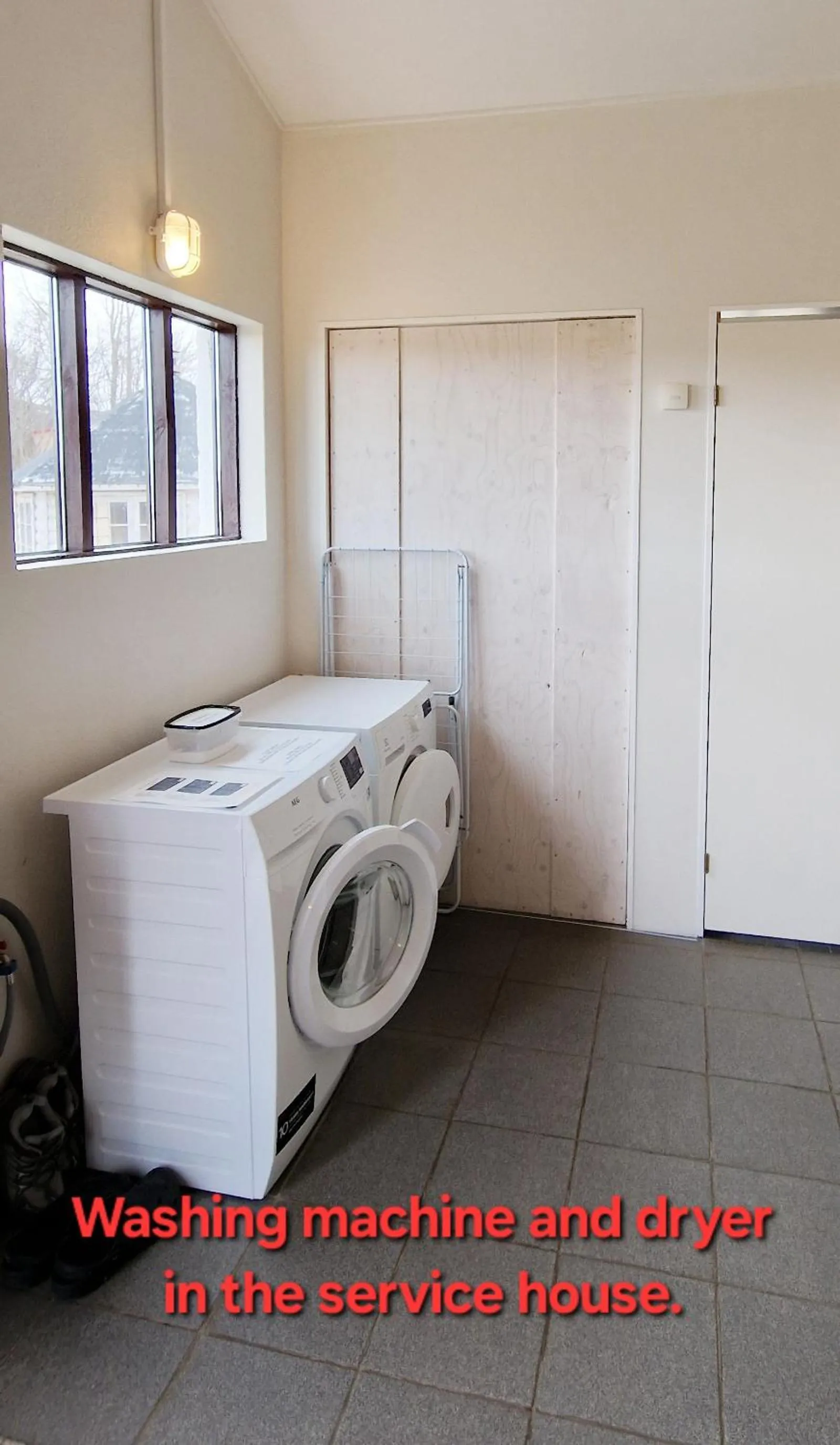 washing machine in Mjóanes accommodation