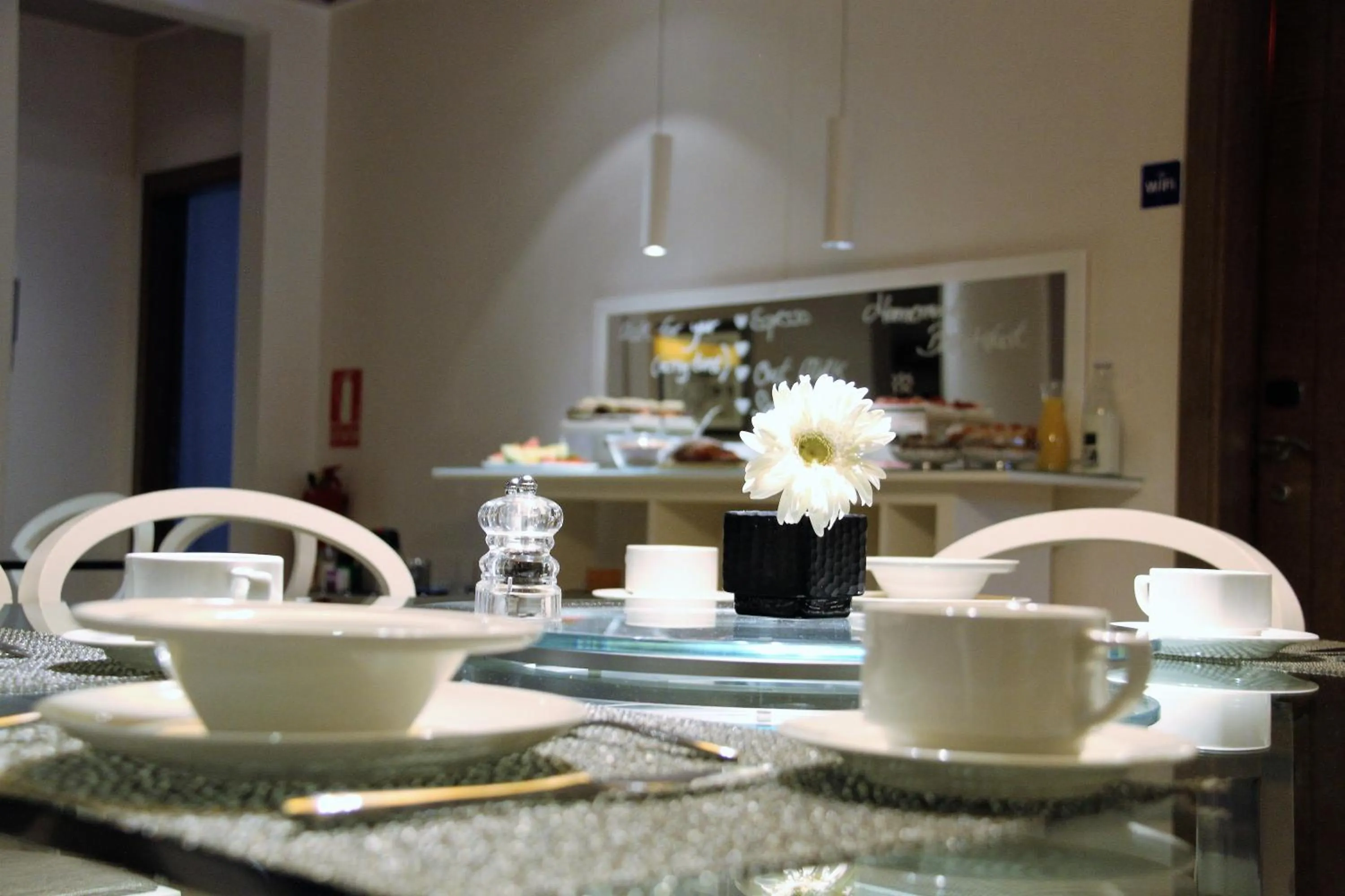 Communal lounge/ TV room, Restaurant/Places to Eat in Anba Boutique