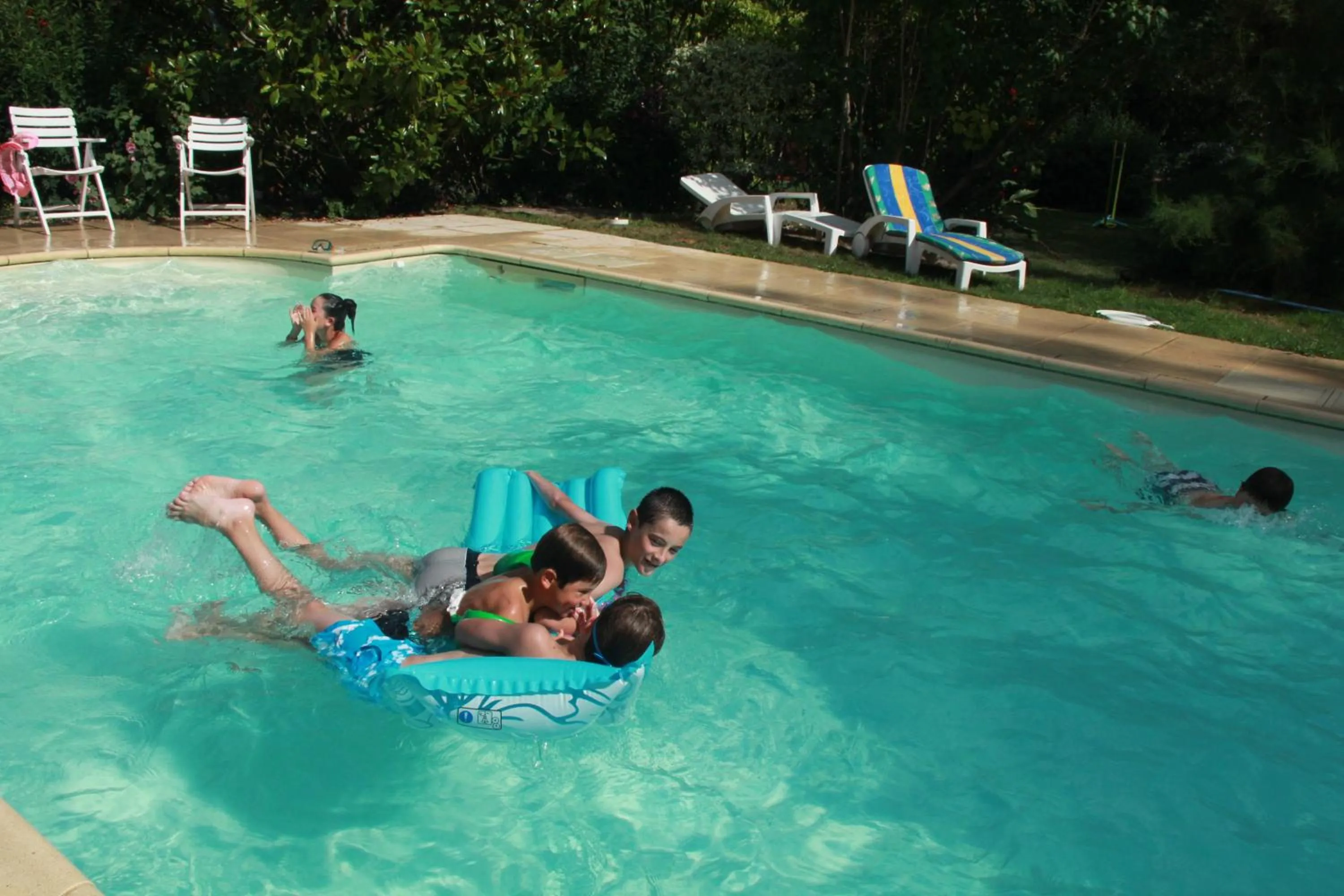 Swimming pool in Manoir le Bout du Pont-Chambres d'Hôtes