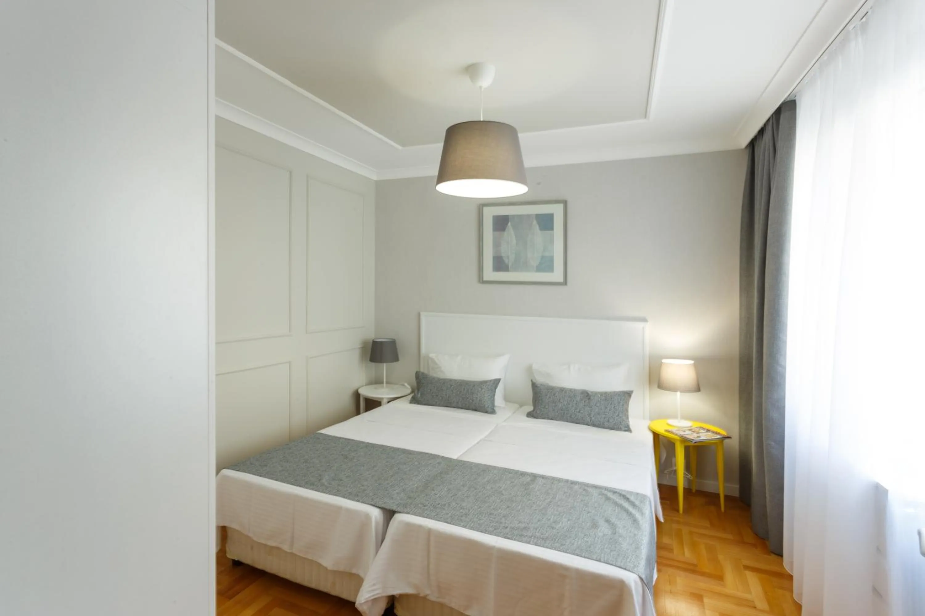 Bed in CityResidence Aparthotel