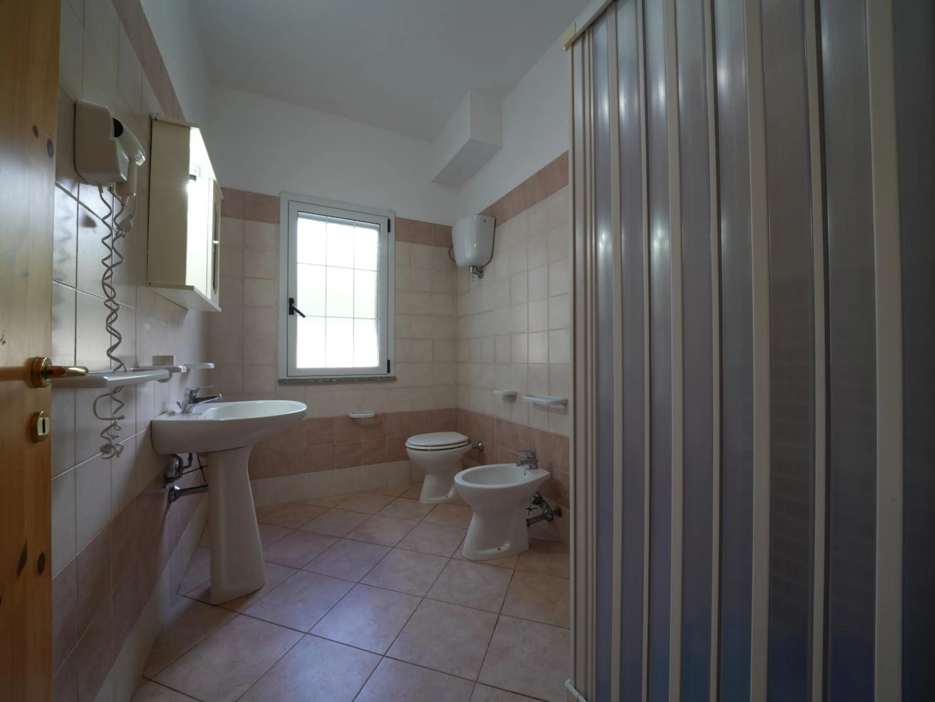 Bathroom in Rosy Hotel Residence