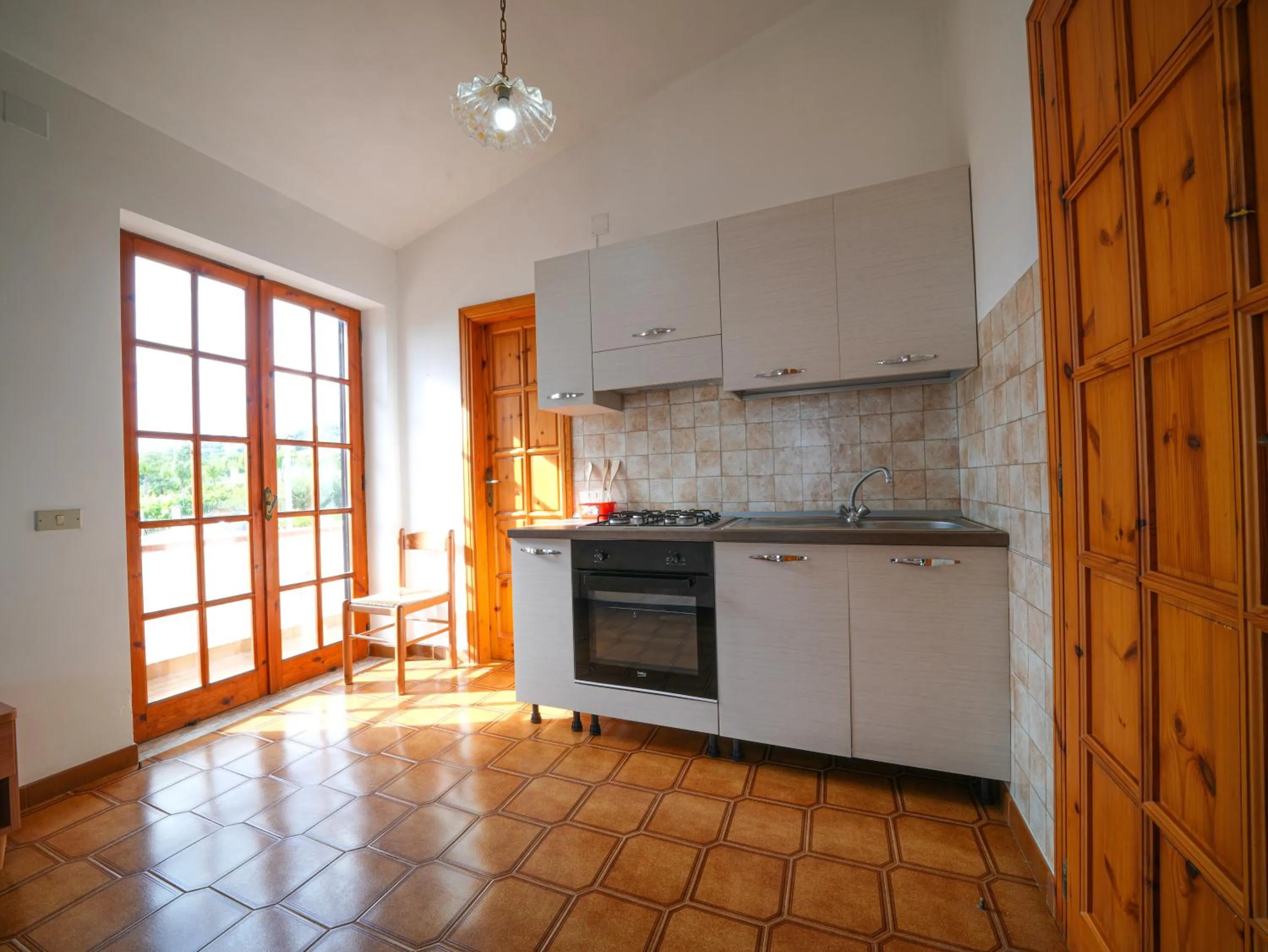 Kitchen or kitchenette in Rosy Hotel Residence