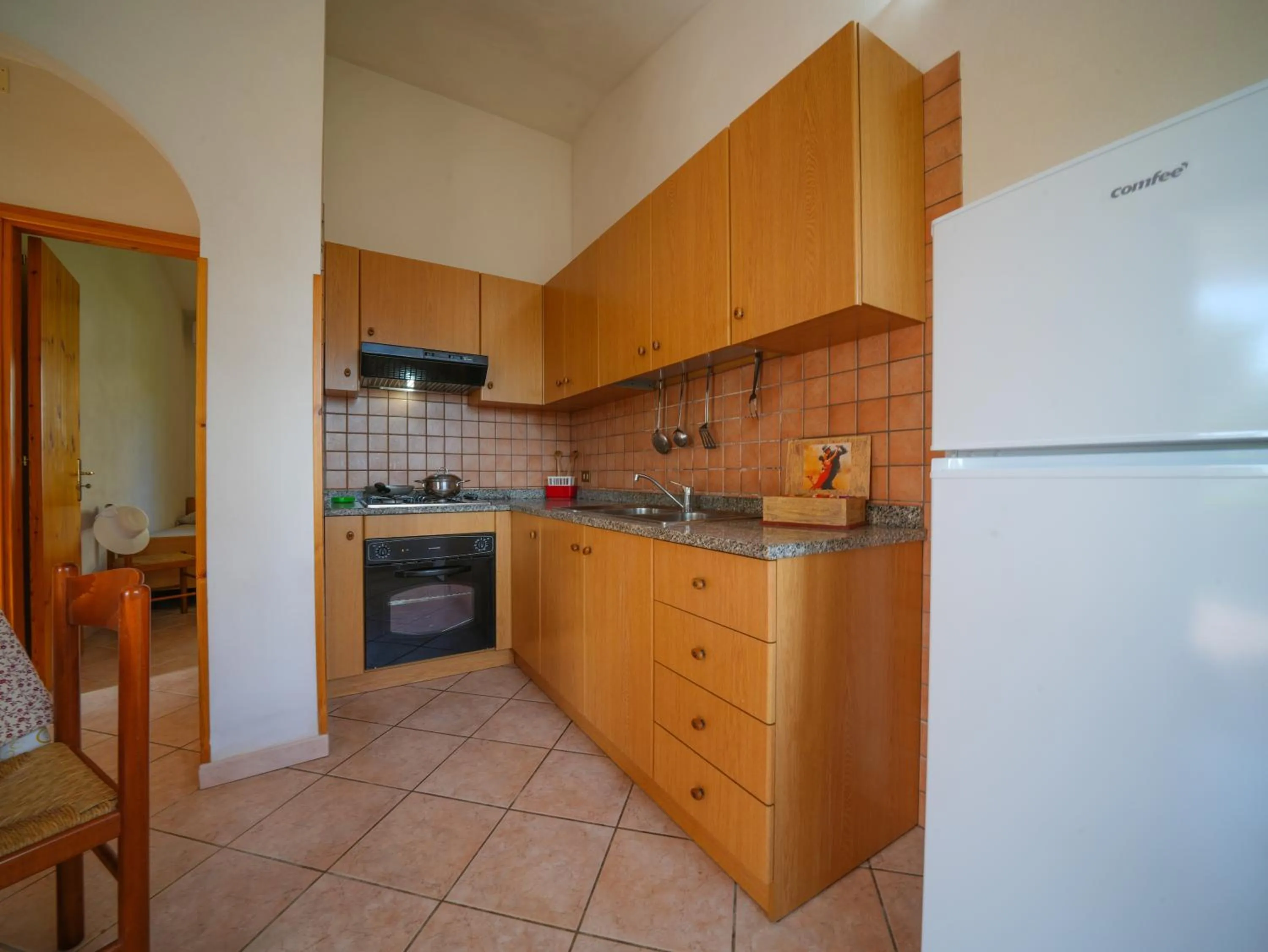 Kitchen or kitchenette in Rosy Hotel Residence