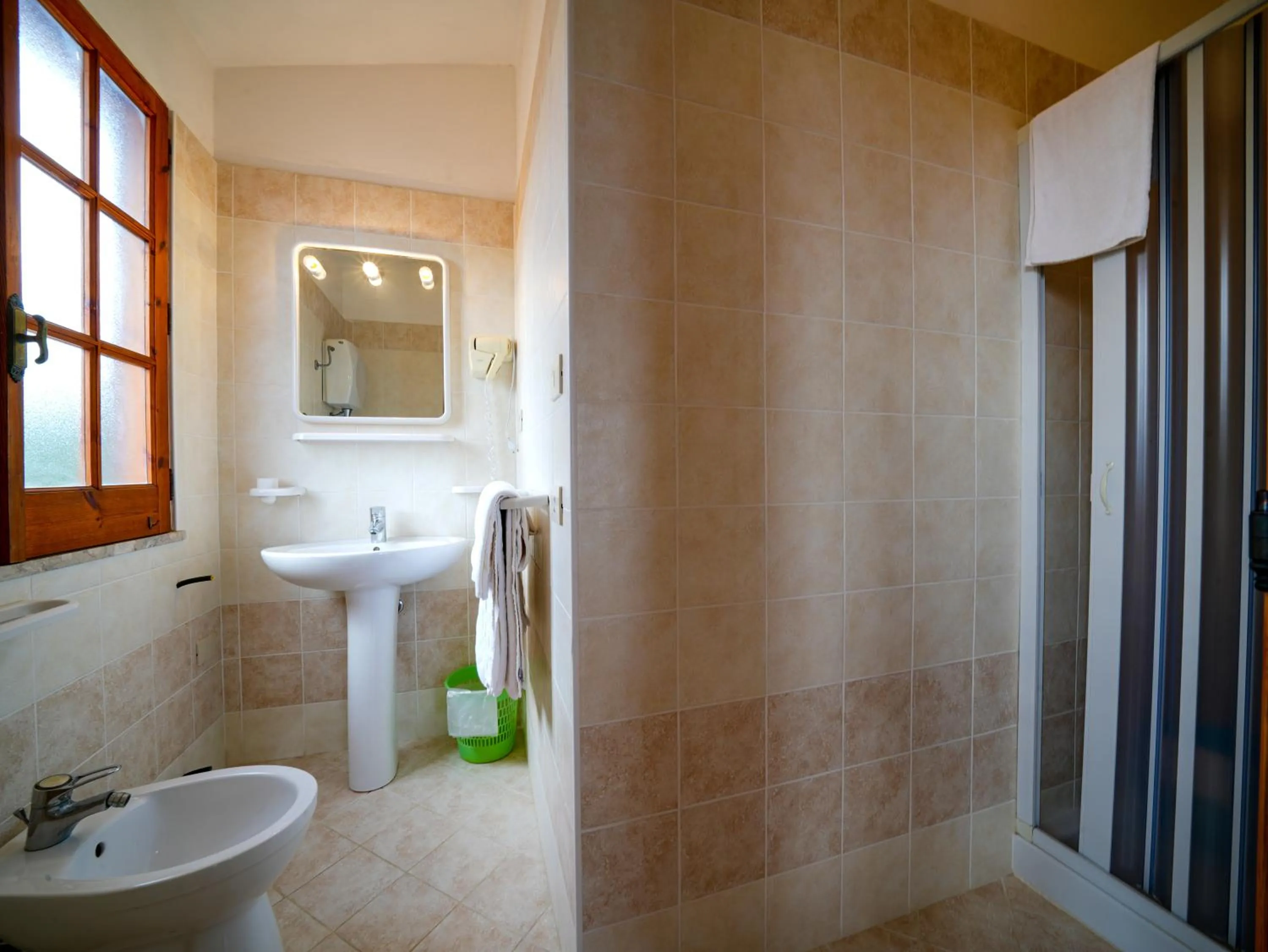 Bathroom in Rosy Hotel Residence