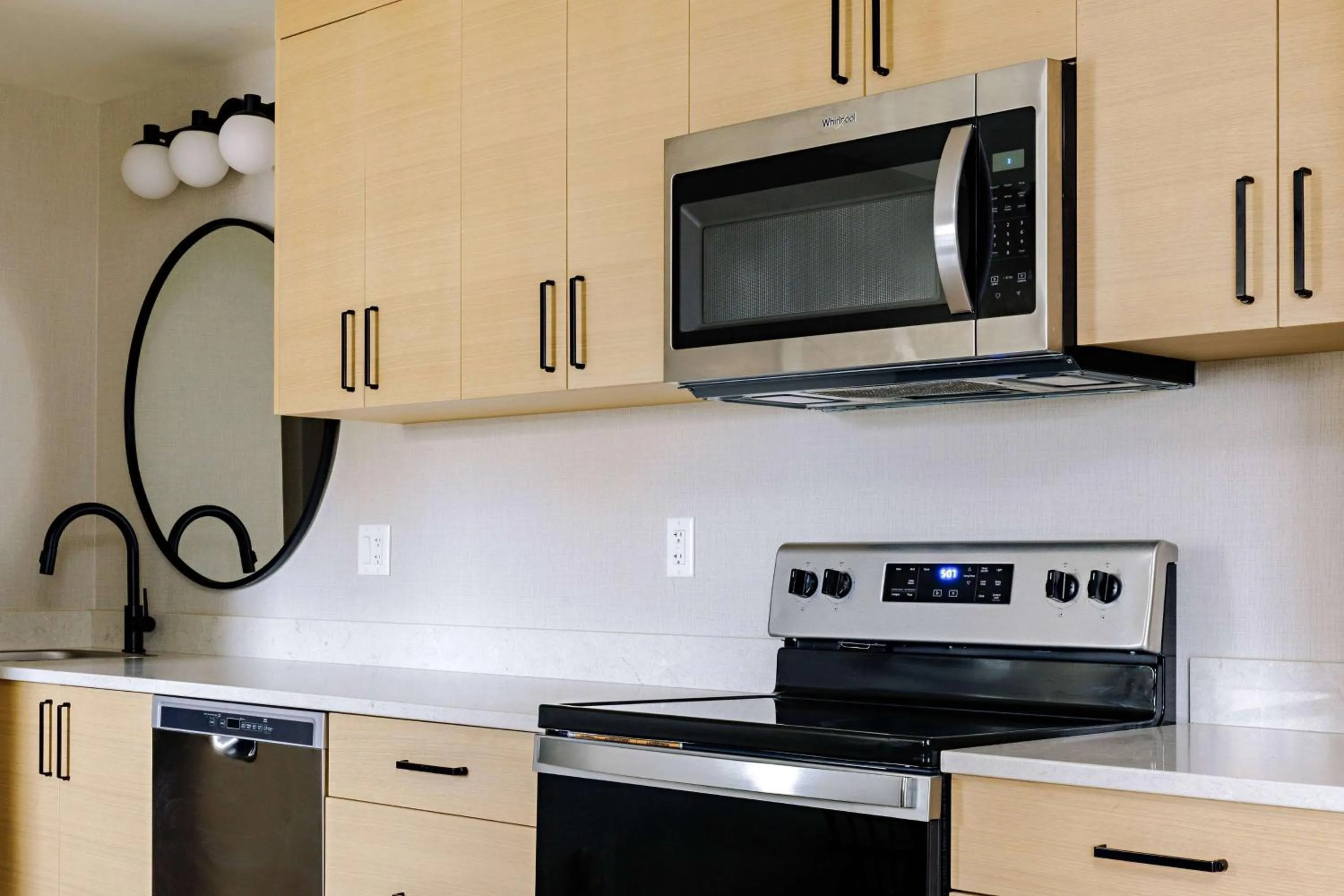 Kitchen or kitchenette in Balcomo, a Ramada by Wyndham