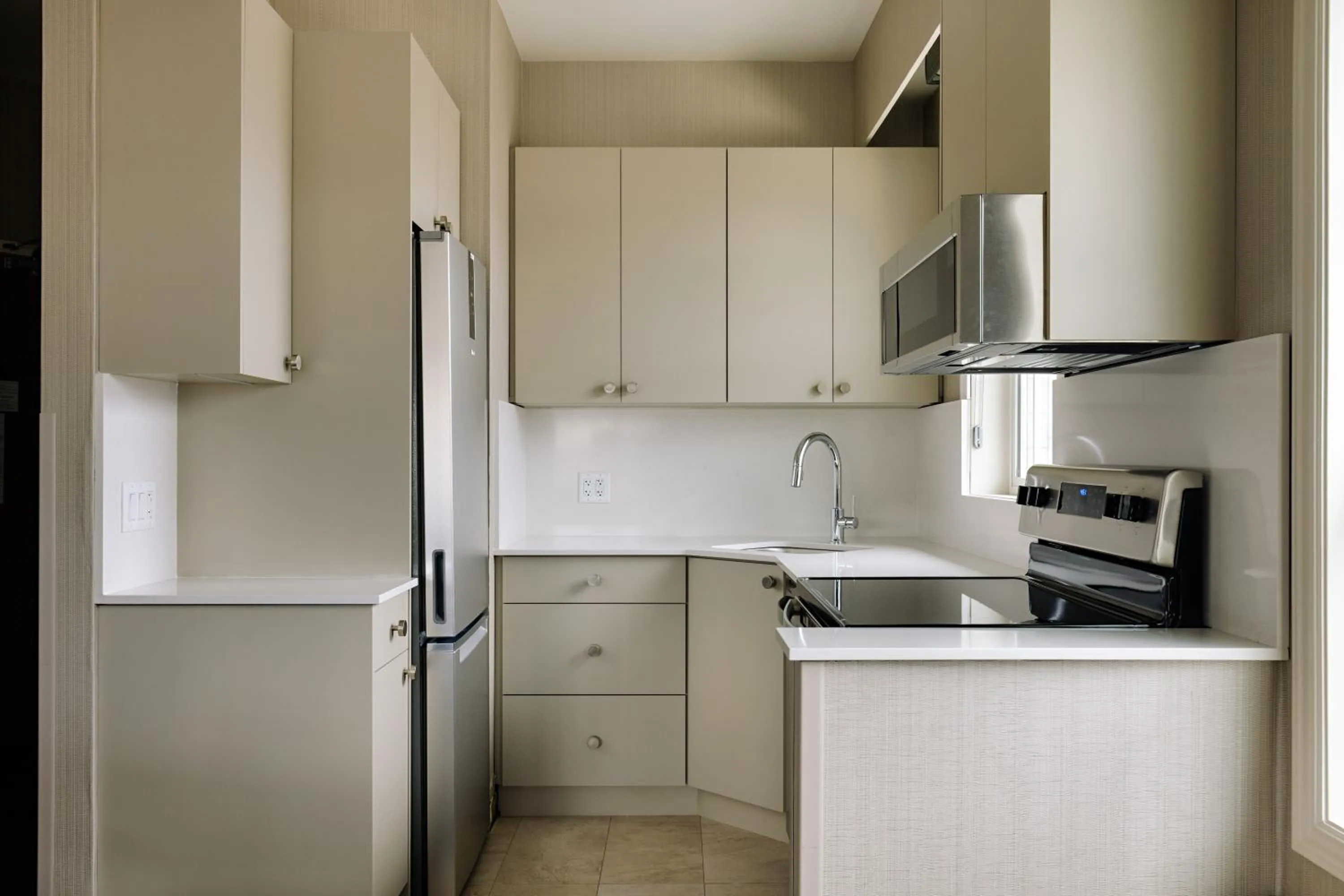 Kitchen or kitchenette in Balcomo, a Ramada by Wyndham