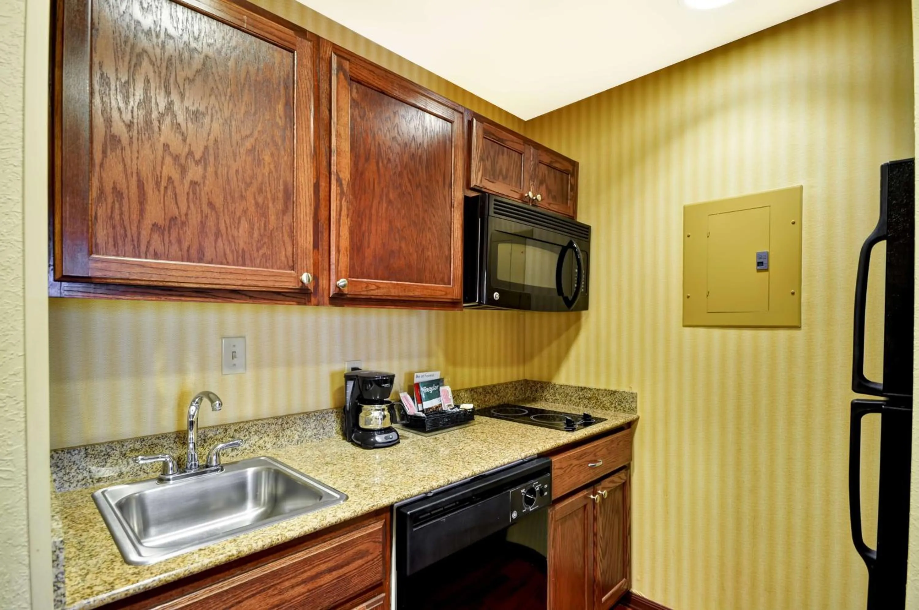 Bed in Homewood Suites by Hilton Tulsa-South