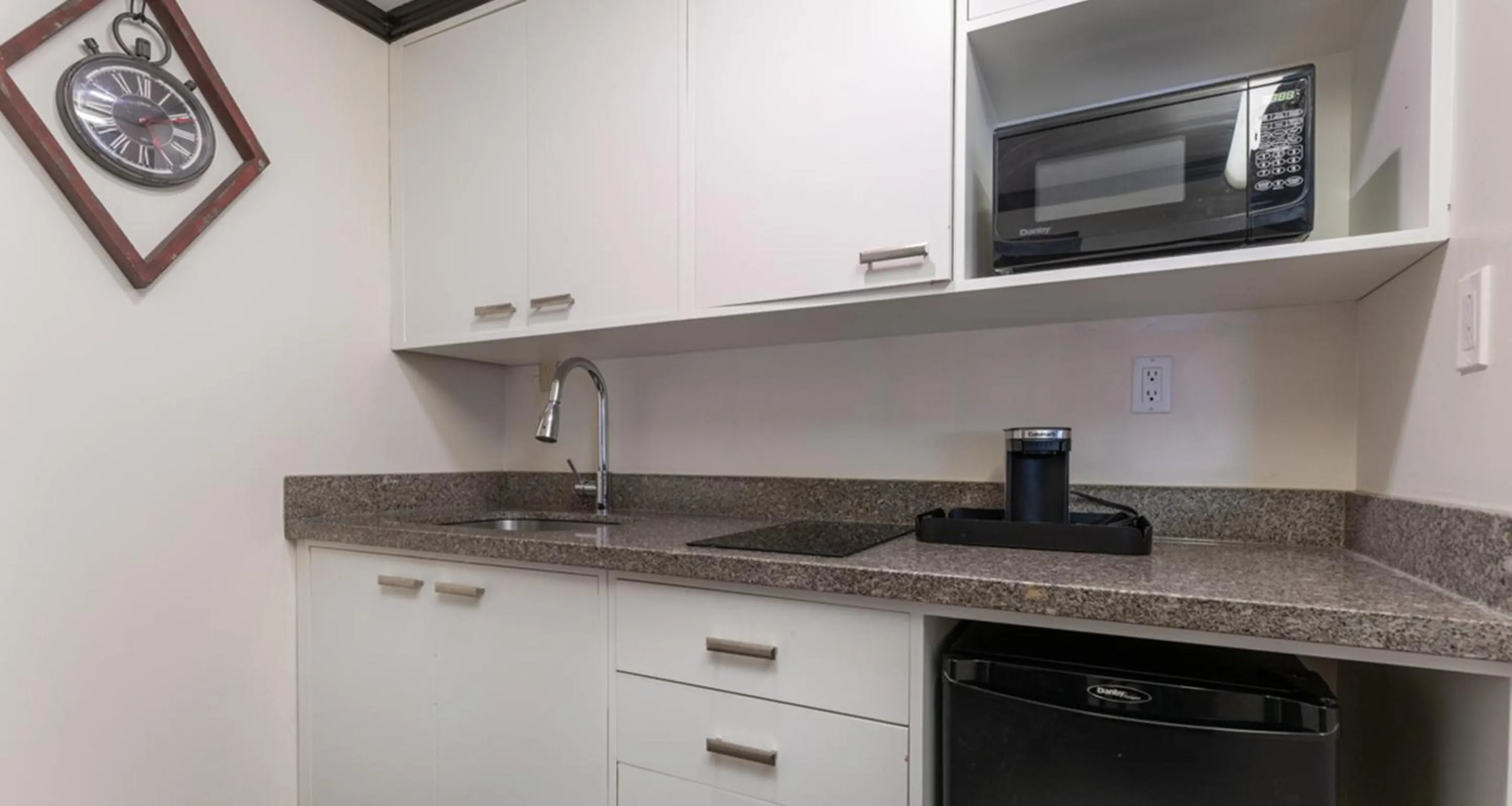 Kitchen or kitchenette in Prestige Oceanview Hotel Prince Rupert