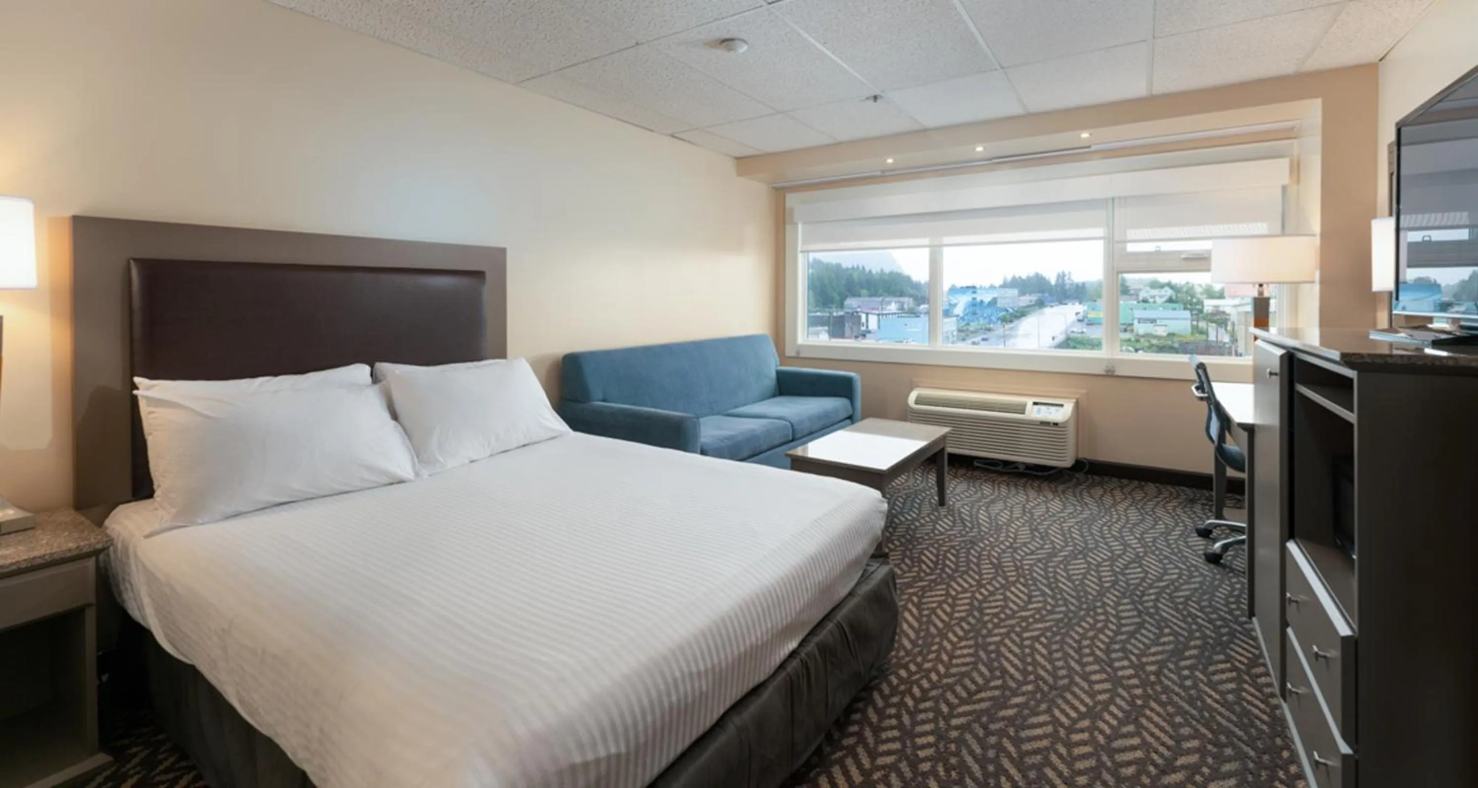 Bed in Prestige Oceanview Hotel Prince Rupert