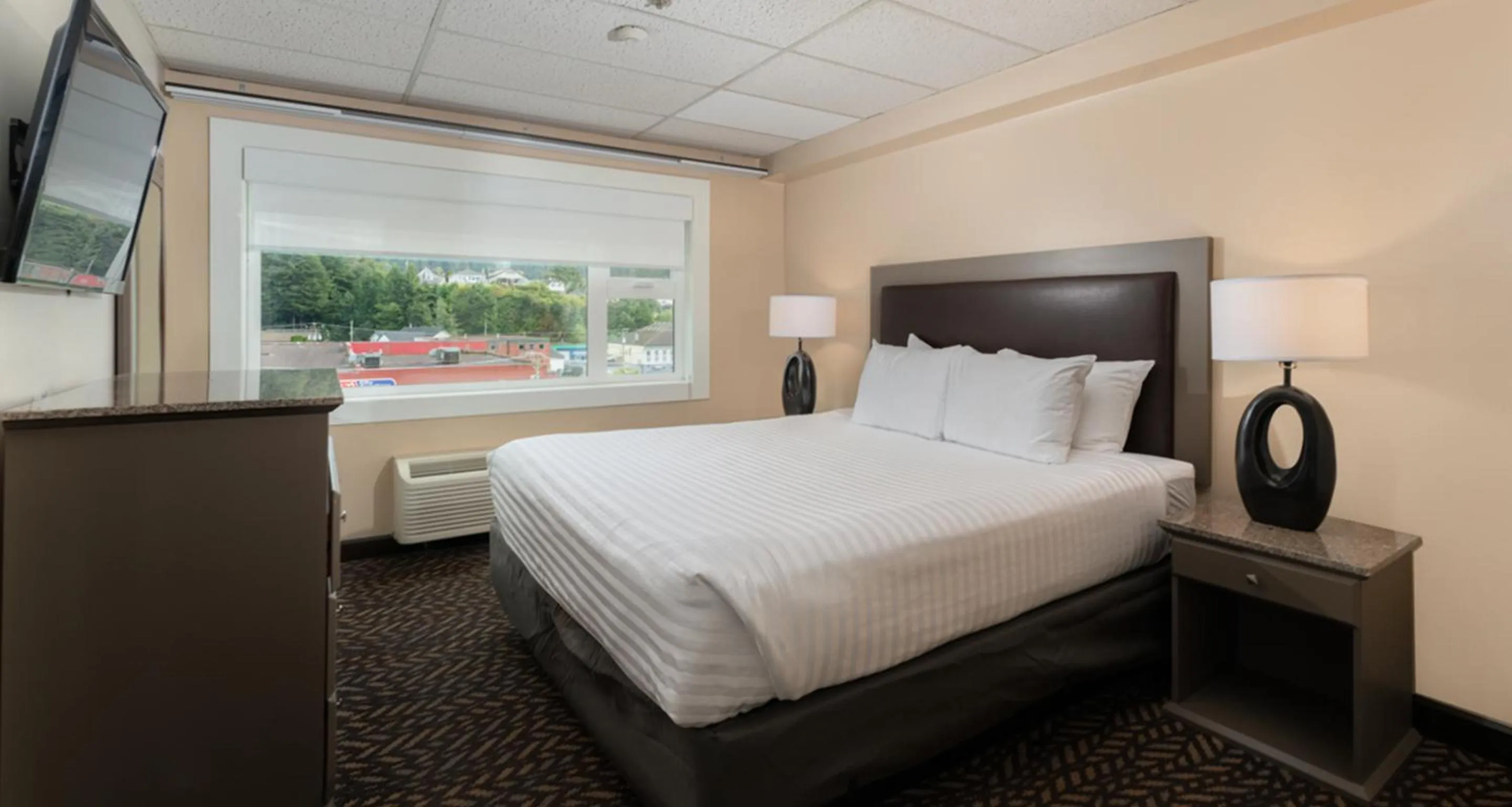 Bed in Prestige Oceanview Hotel Prince Rupert