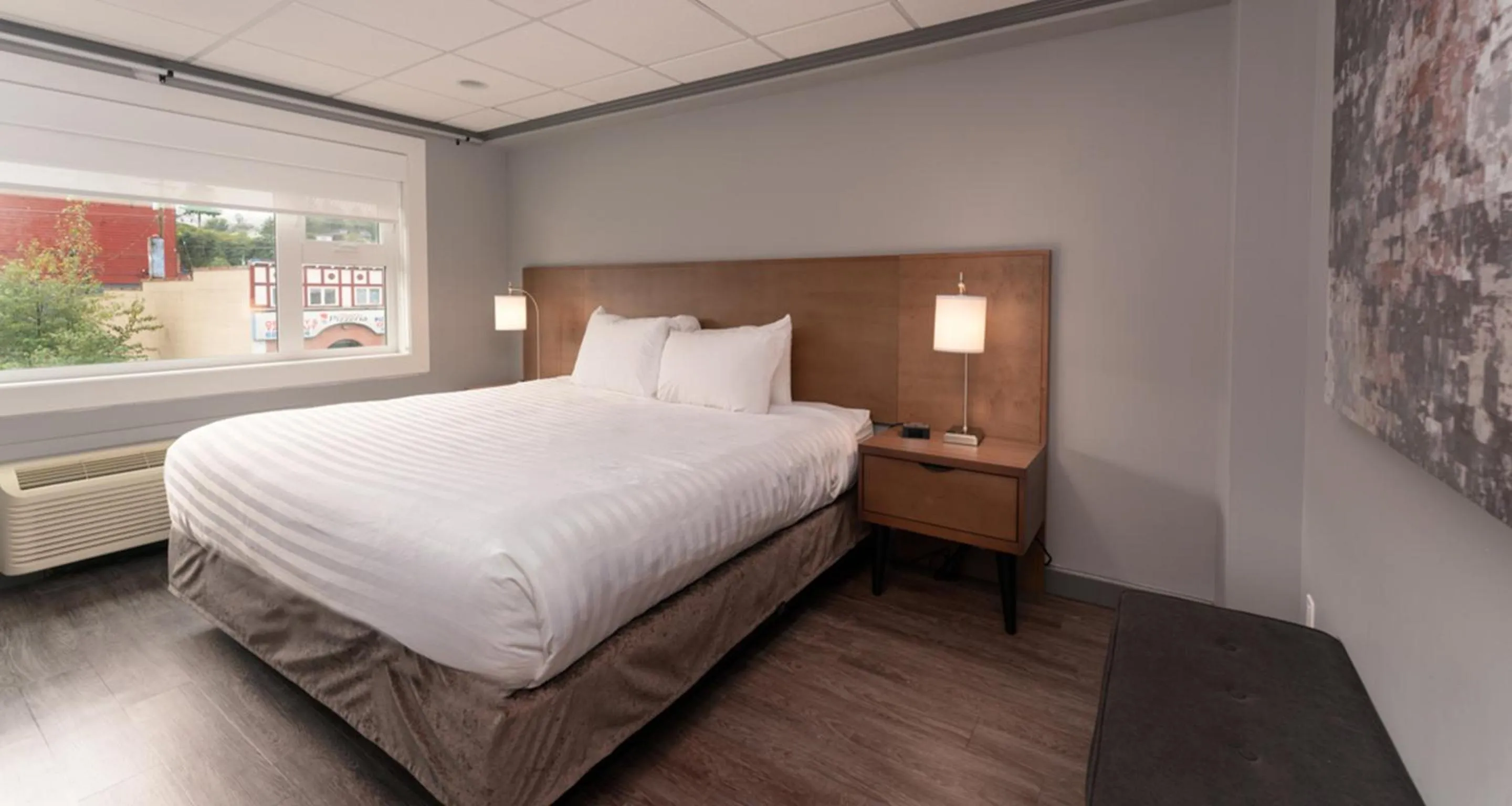 Bed in Prestige Oceanview Hotel Prince Rupert