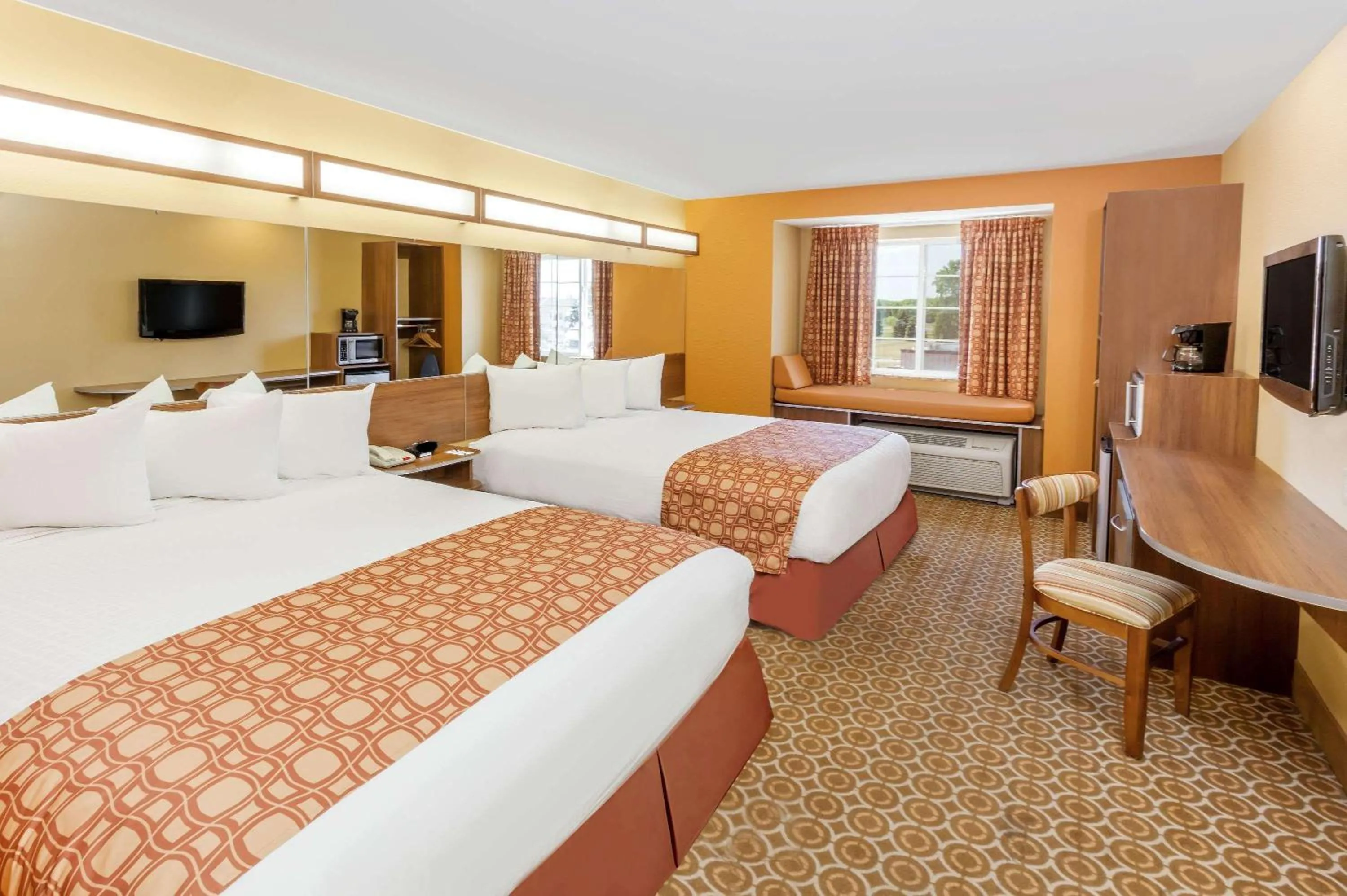 Photo of the whole room, Bed in Microtel by Wyndham South Bend Notre Dame University