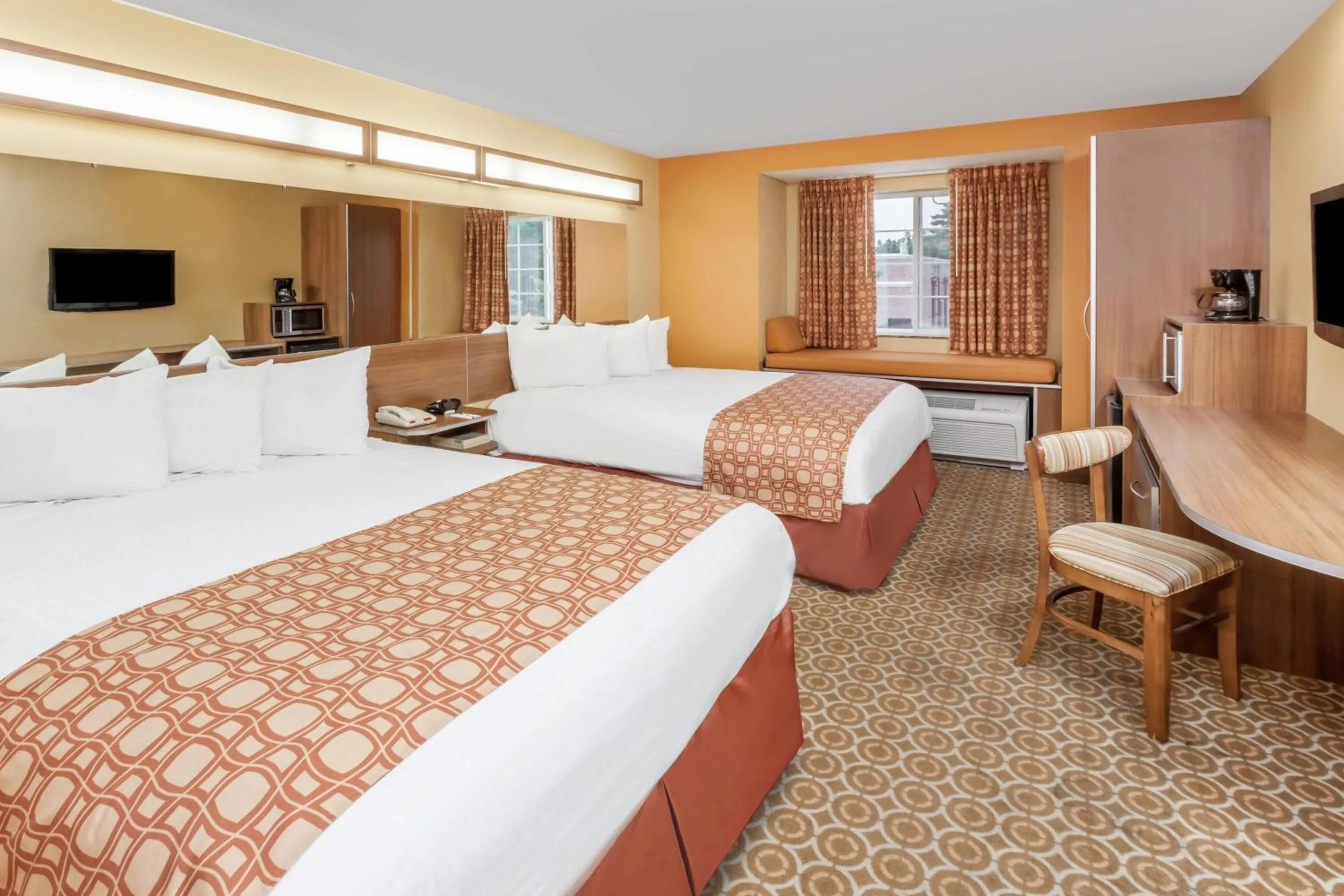 Photo of the whole room, Bed in Microtel by Wyndham South Bend Notre Dame University
