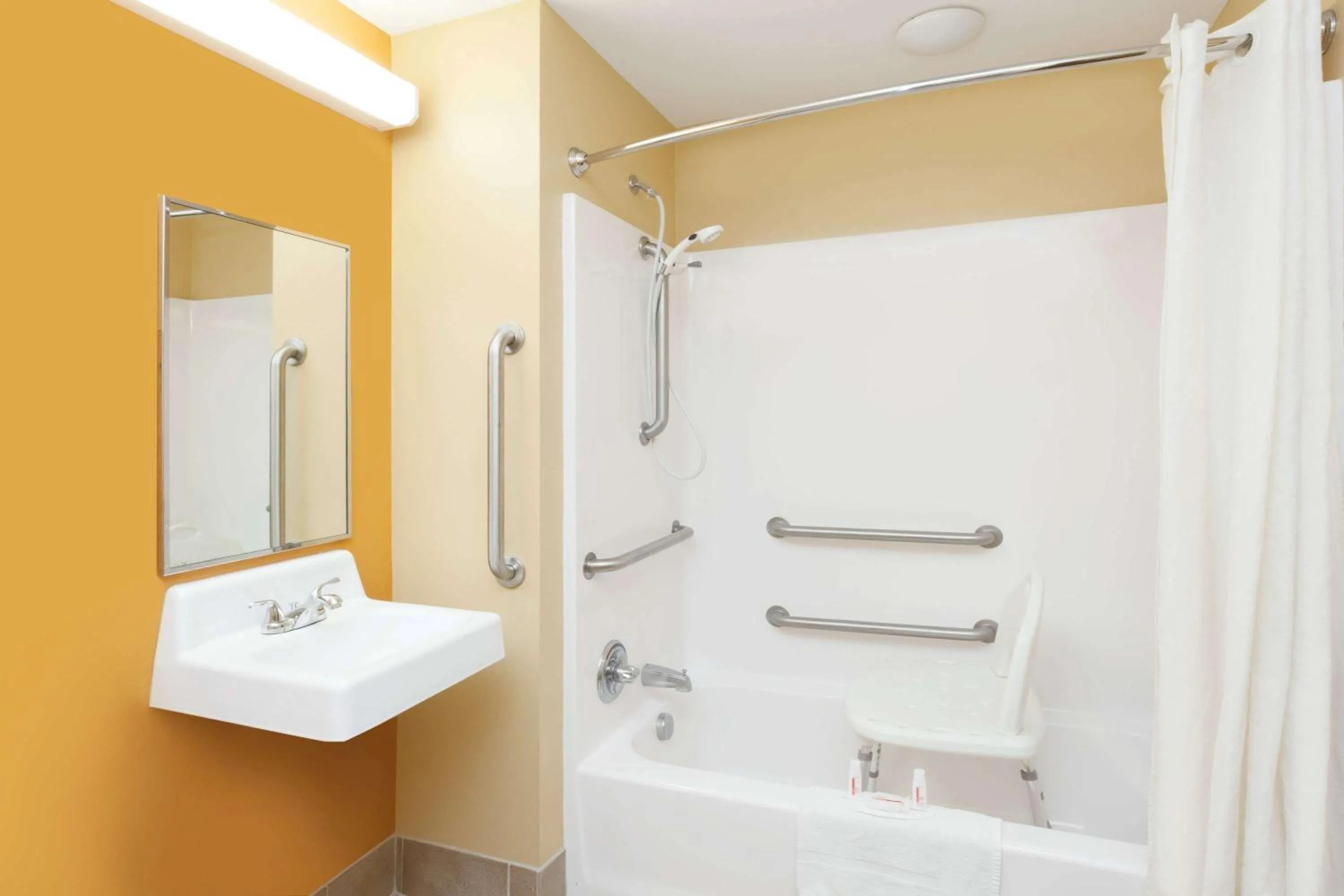 Bathroom in Microtel by Wyndham South Bend Notre Dame University