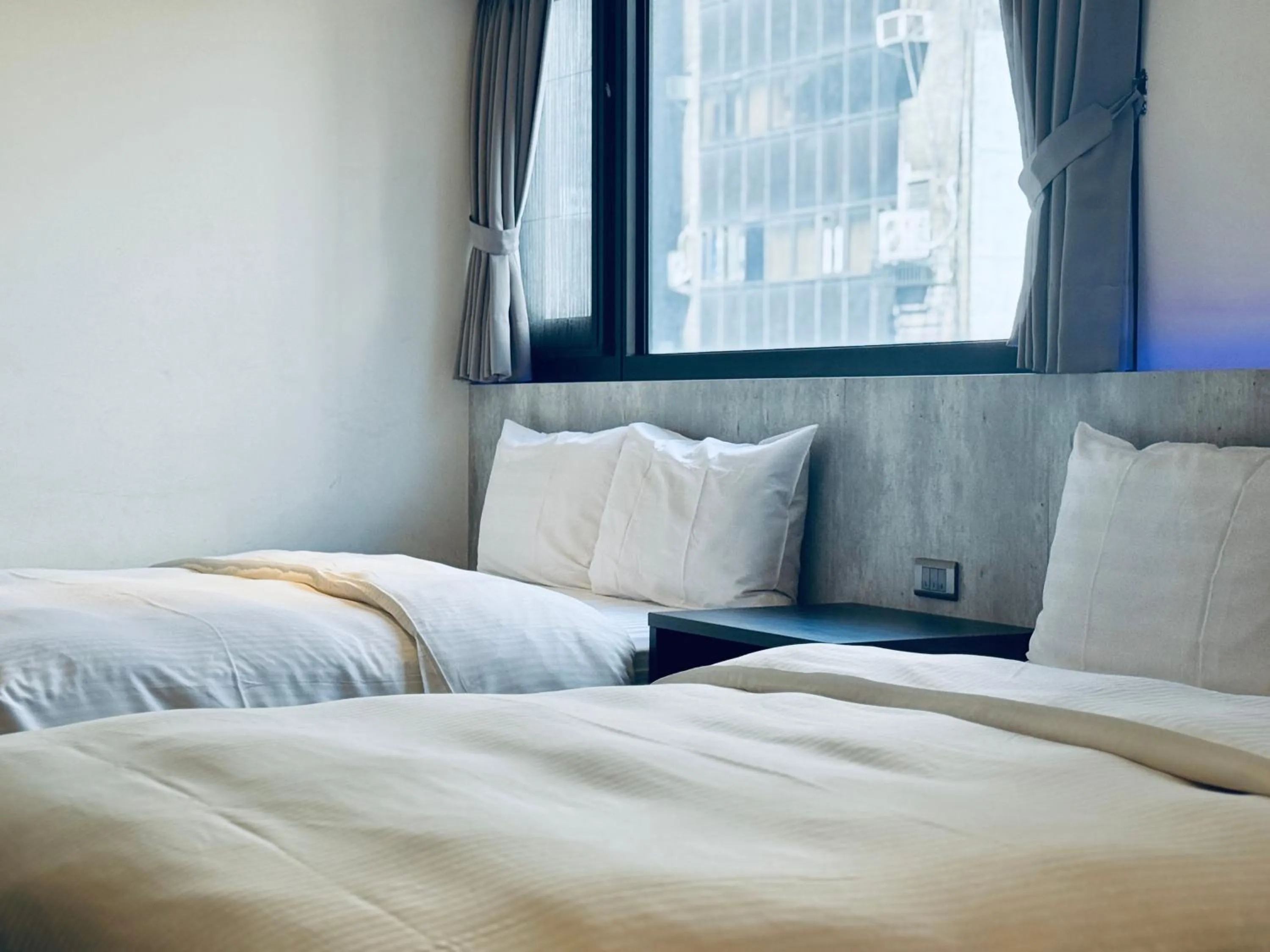 Bed in 泊居旅店二館 Oursinn Hotel 2