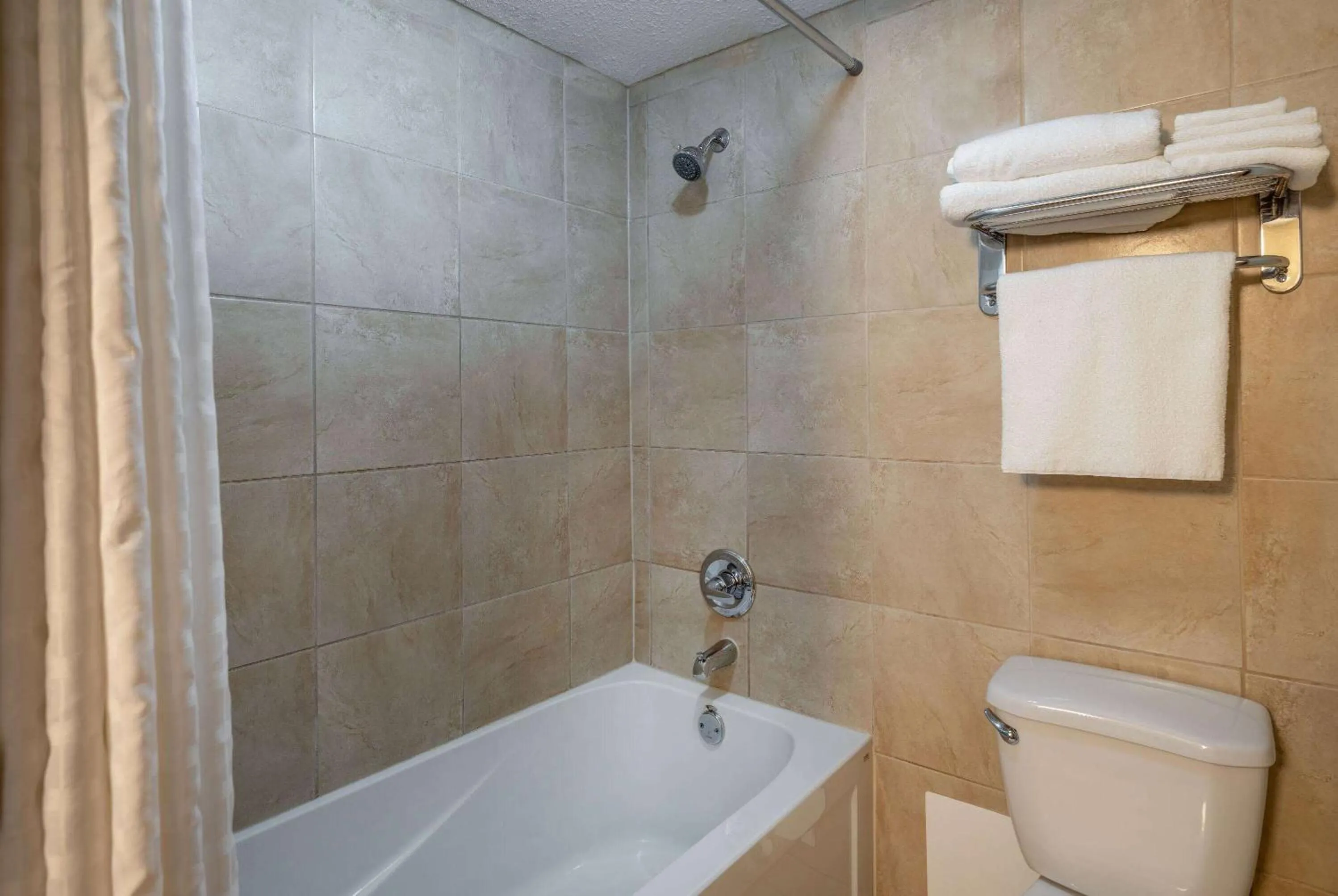 Bathroom in Super 8 by Wyndham Edmonton International Airport